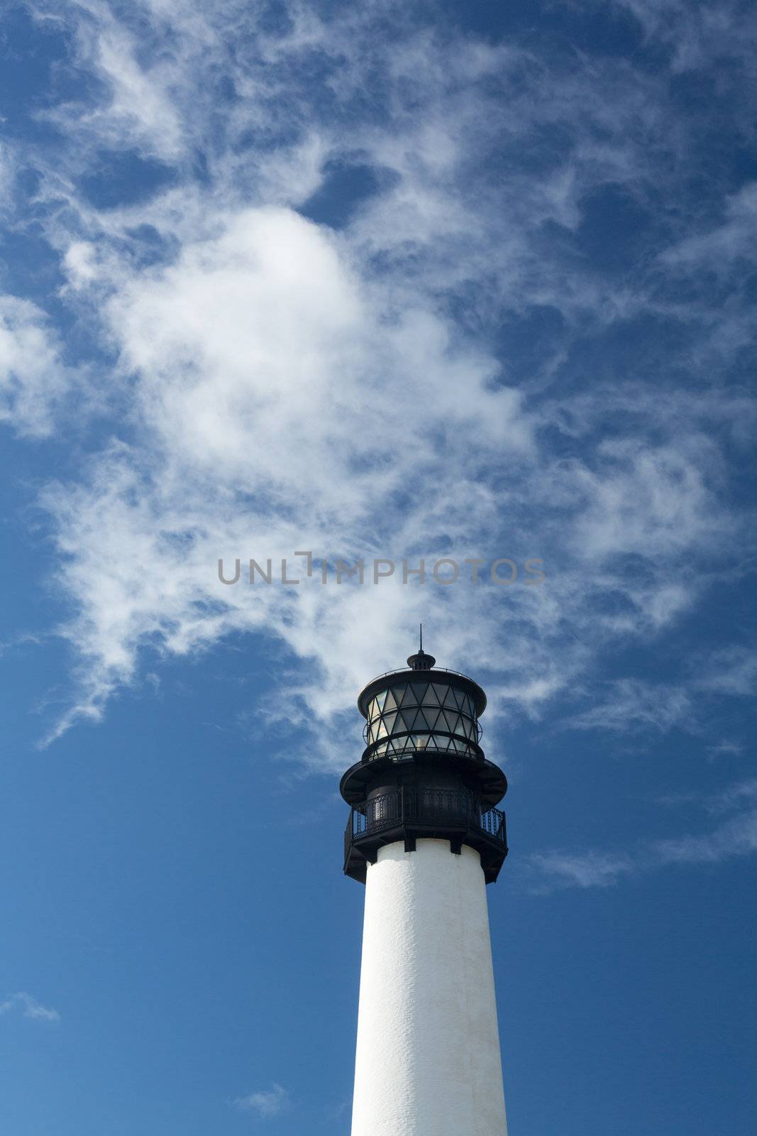 Cape Florida Lighthouse and Lantern in Bill Baggs State Park in Key Biscayne Florida looking like cigarette smoke