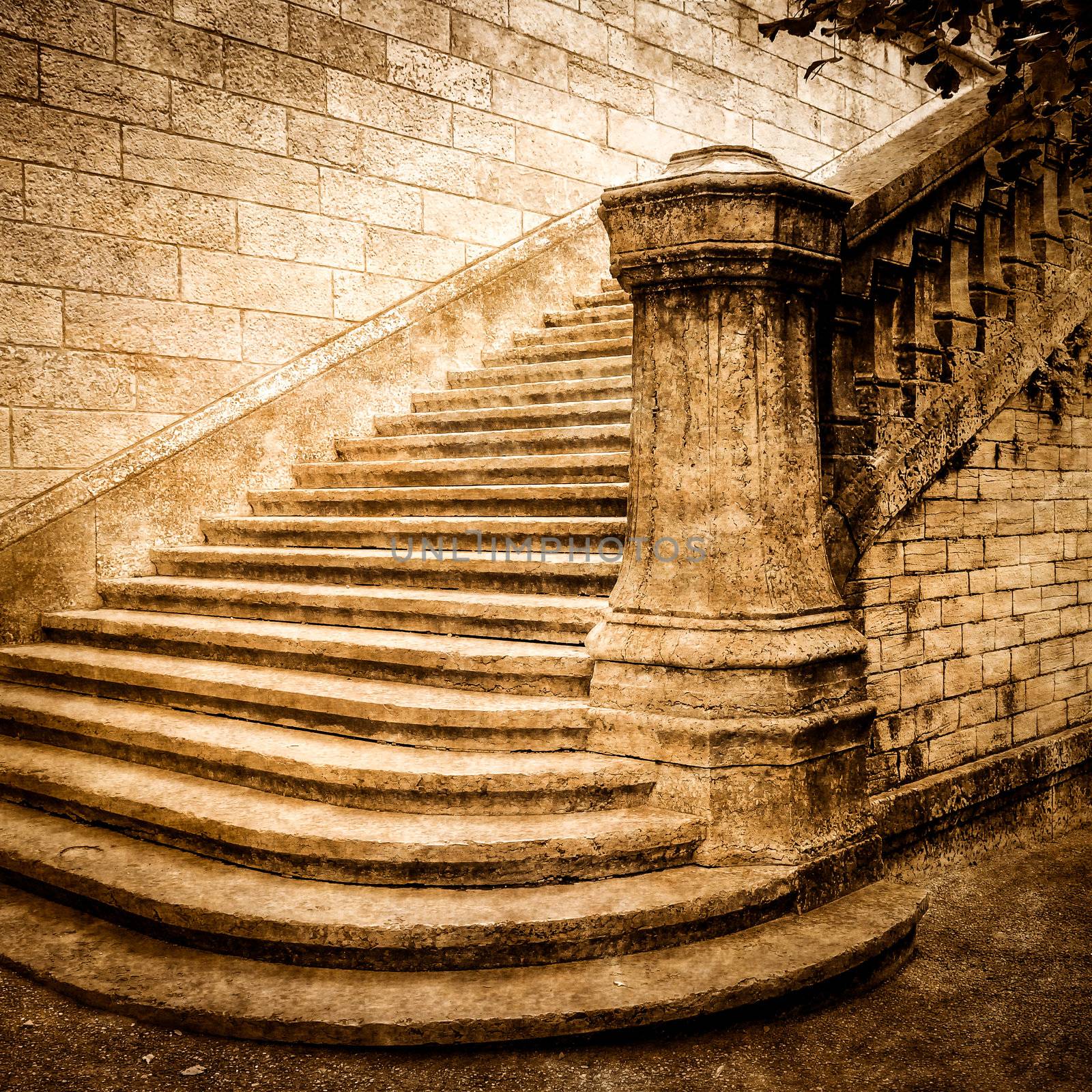 Vintage old brick staircase with brick wall background