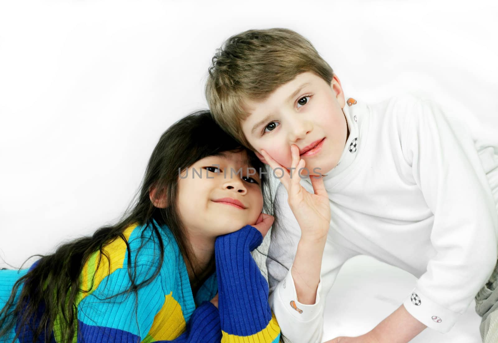 Two friends, boy and girl of different races, together 