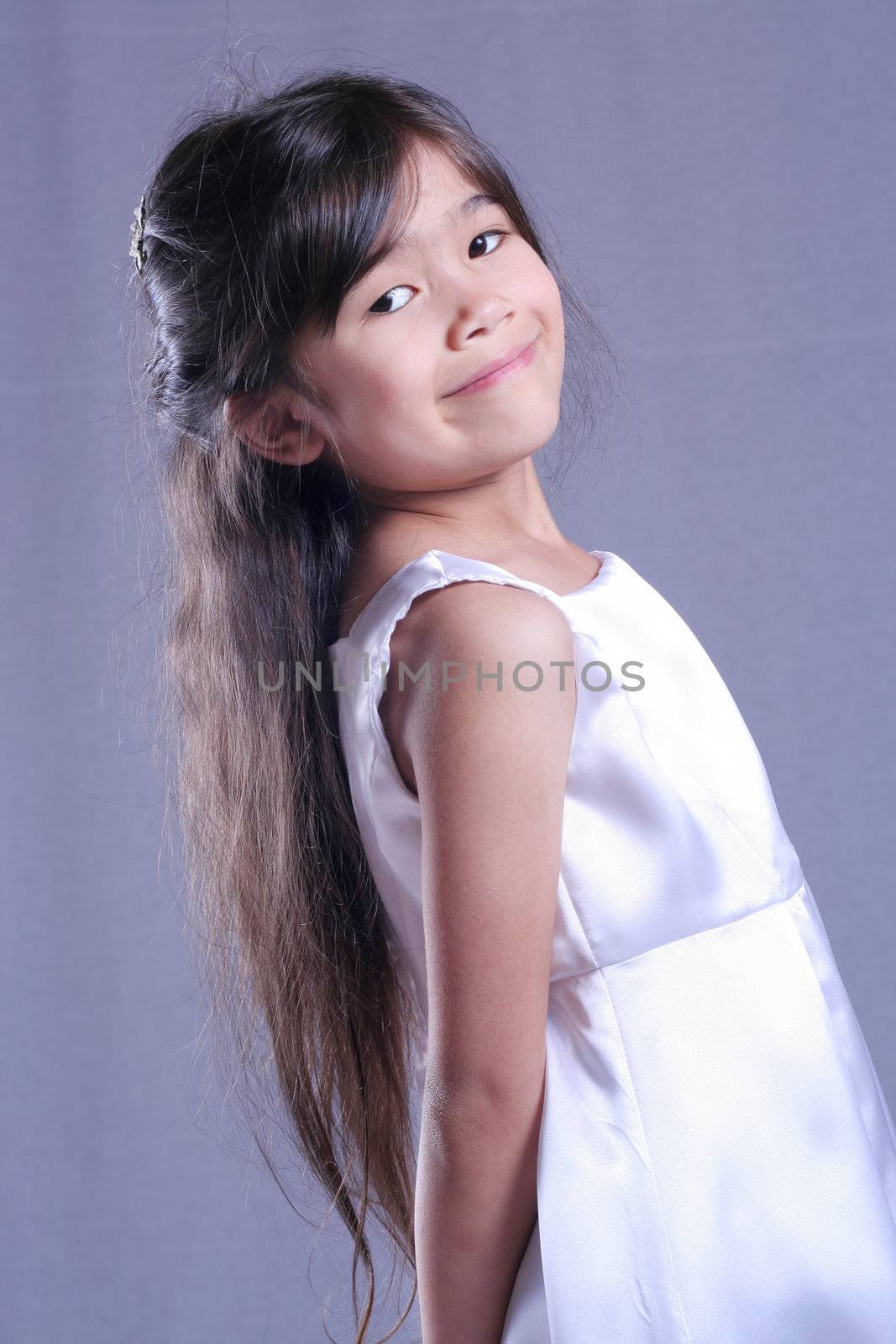 Beautiful little girl in white satin dress by jarenwicklund