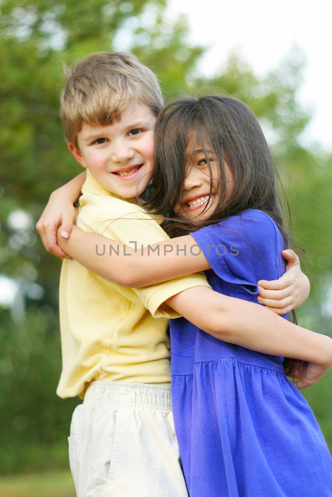 Best friends hugging, multicultural friendships, diversity