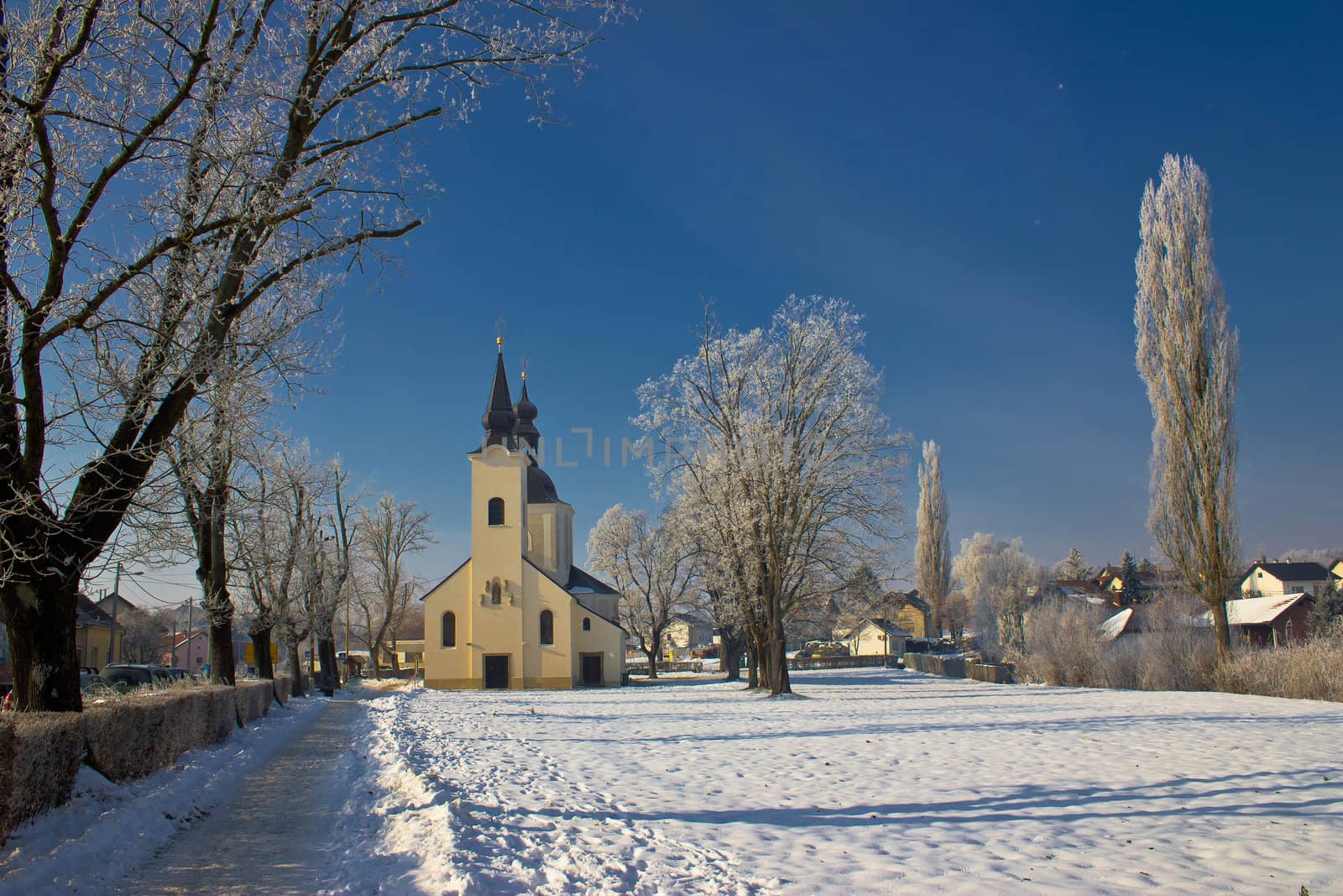 Idyllic winter - Church in snow, Krizevci, Croatia