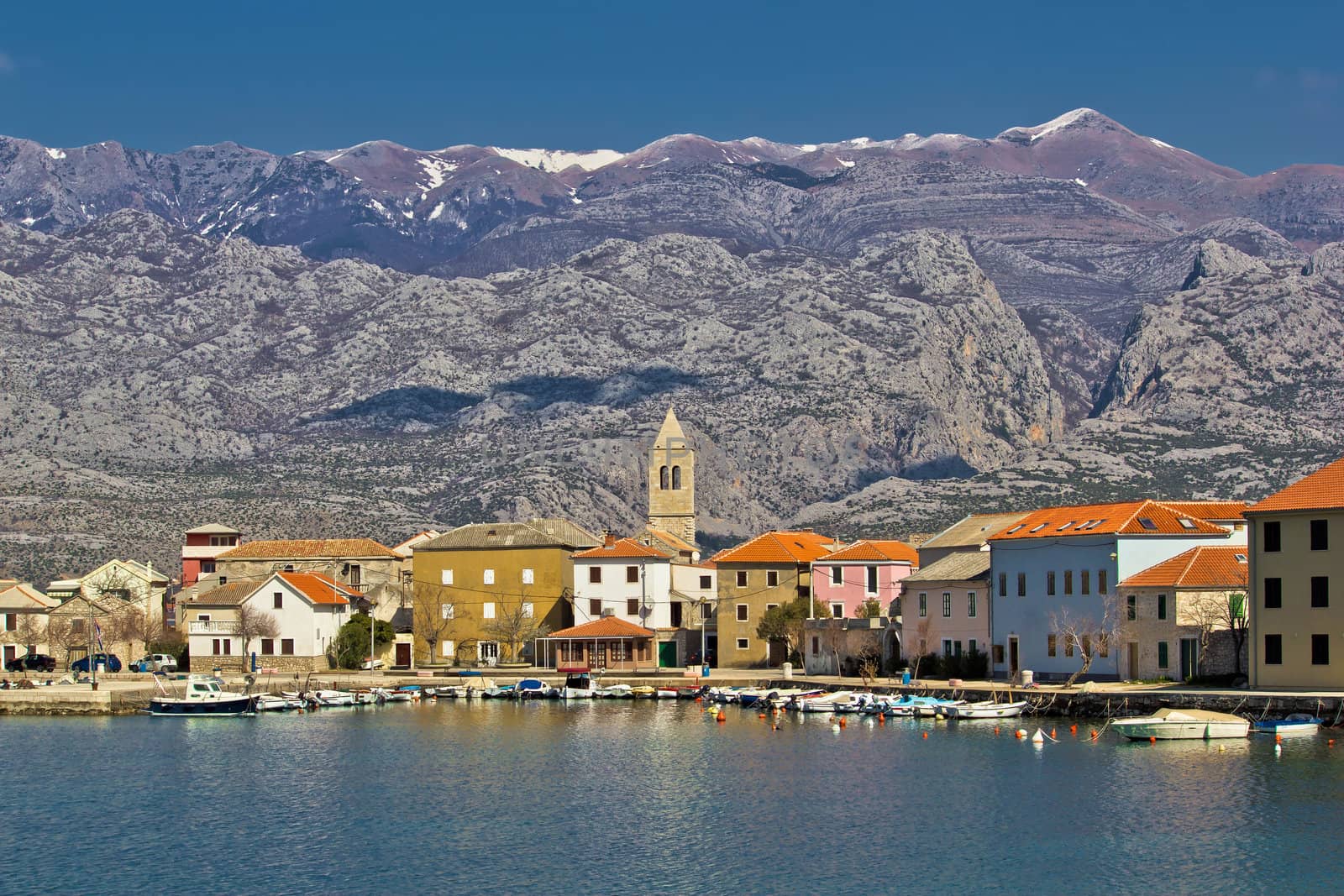 Town of Vinjerac waterfrot view, with Velebit mountain and Paklenica national park background, Dalmatia, Croatia