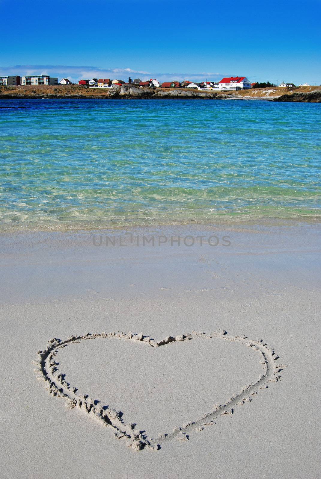 beach with heart in the sand