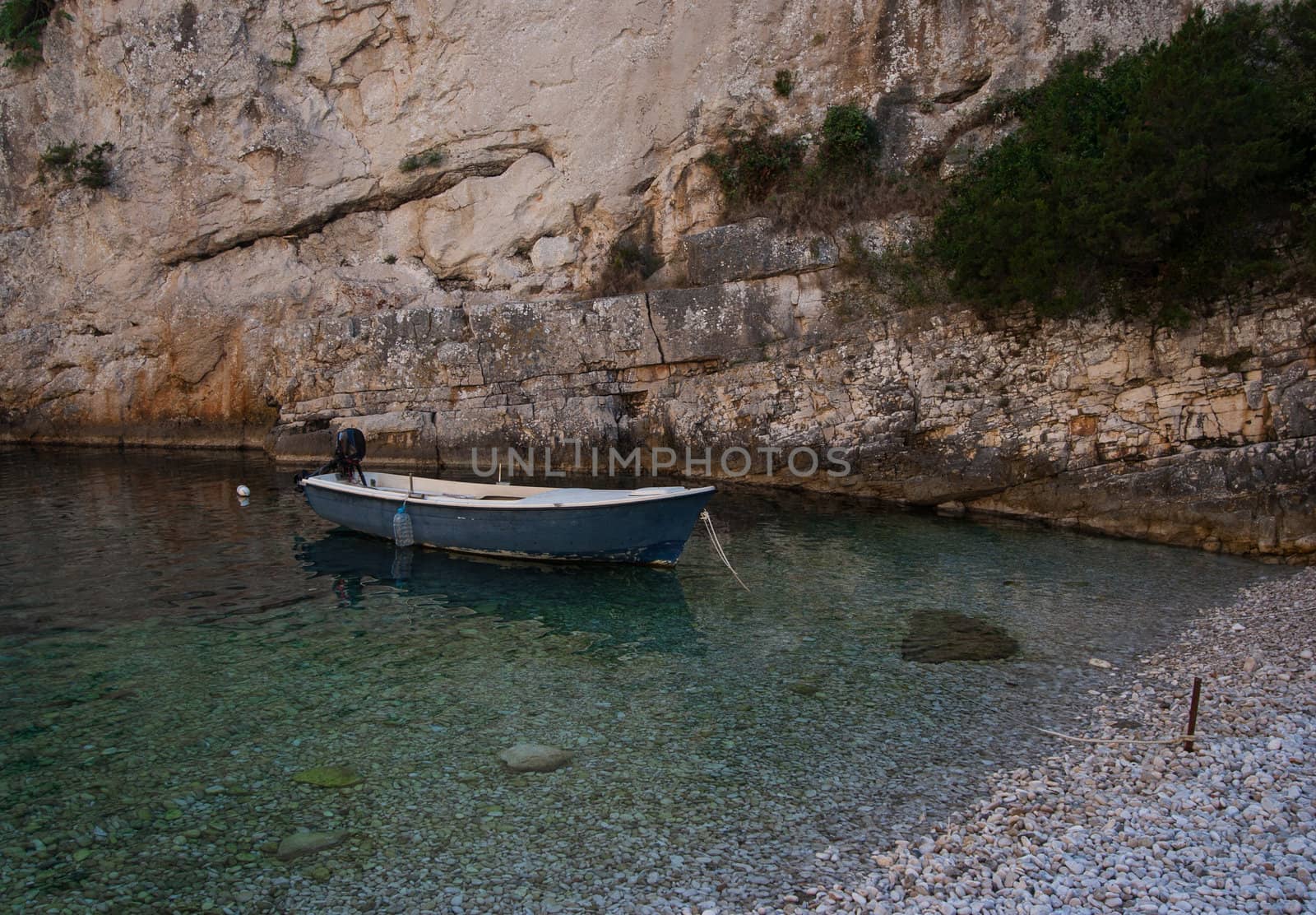 White boat on the beach in Stiniva bay