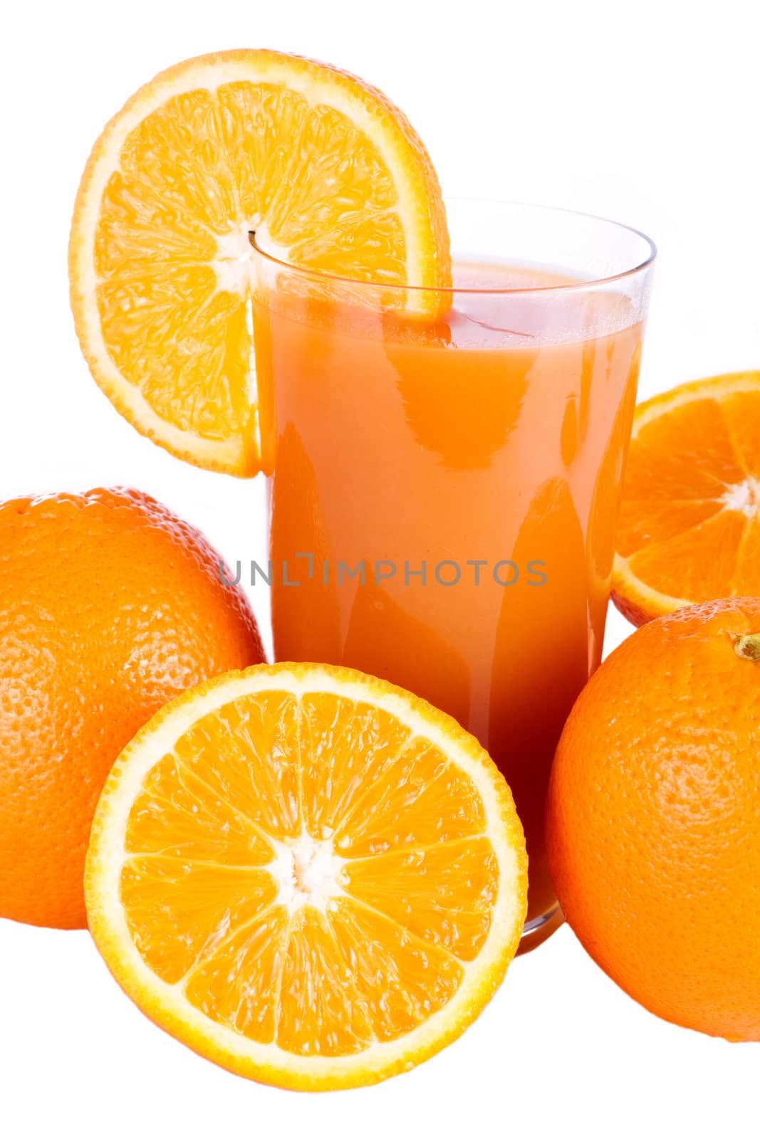A glass of fresh orange juice with slice of orange isolated on white

