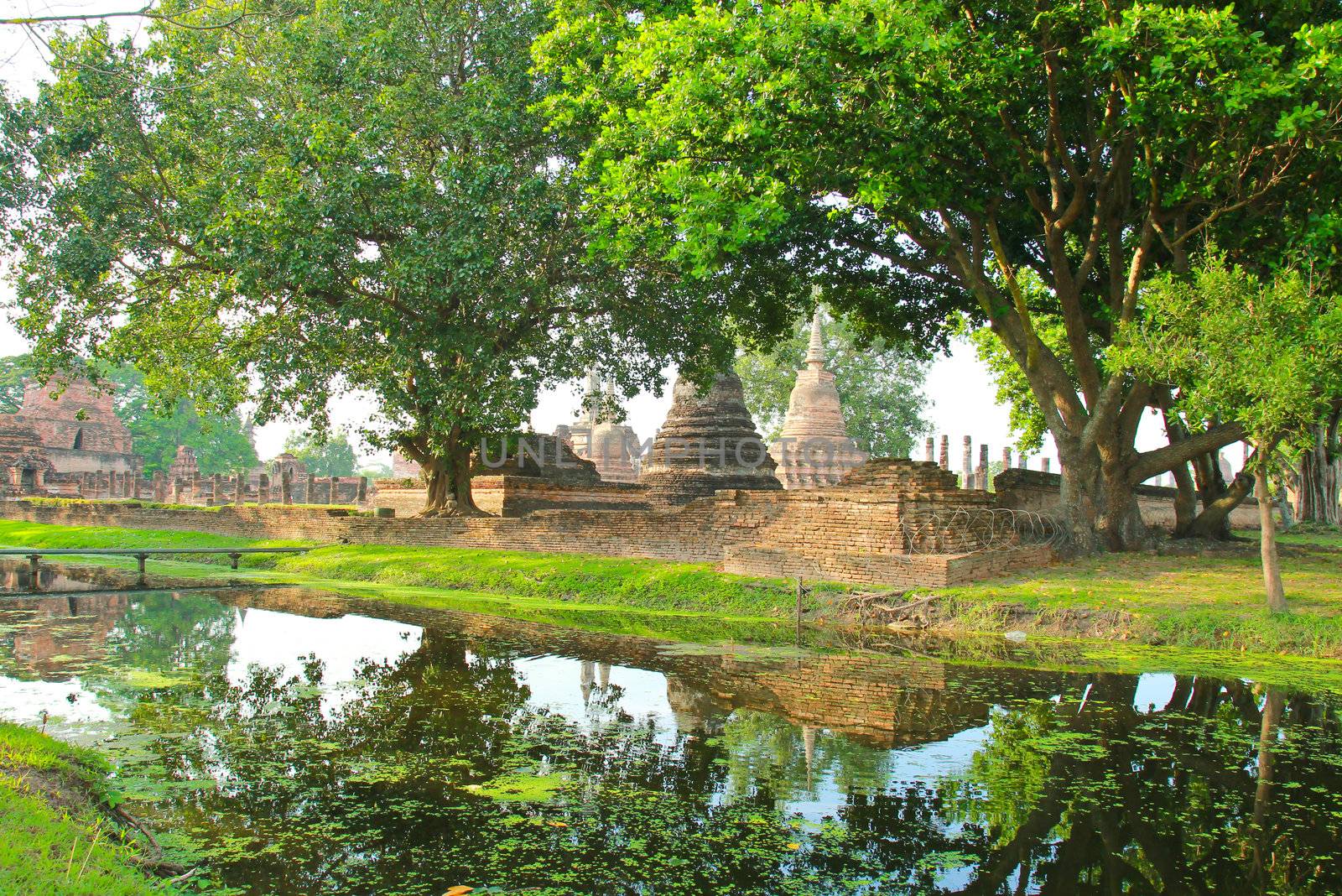 Ancient buddha in Sukhothai historical park, Thailand by nuchylee