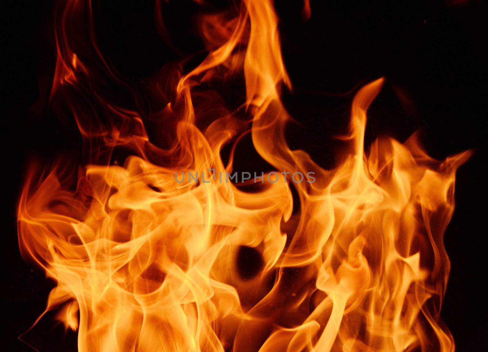 Abstract background / backdrop representing fire. flame pattern with dark and light spots. Can be used as a wallpaper