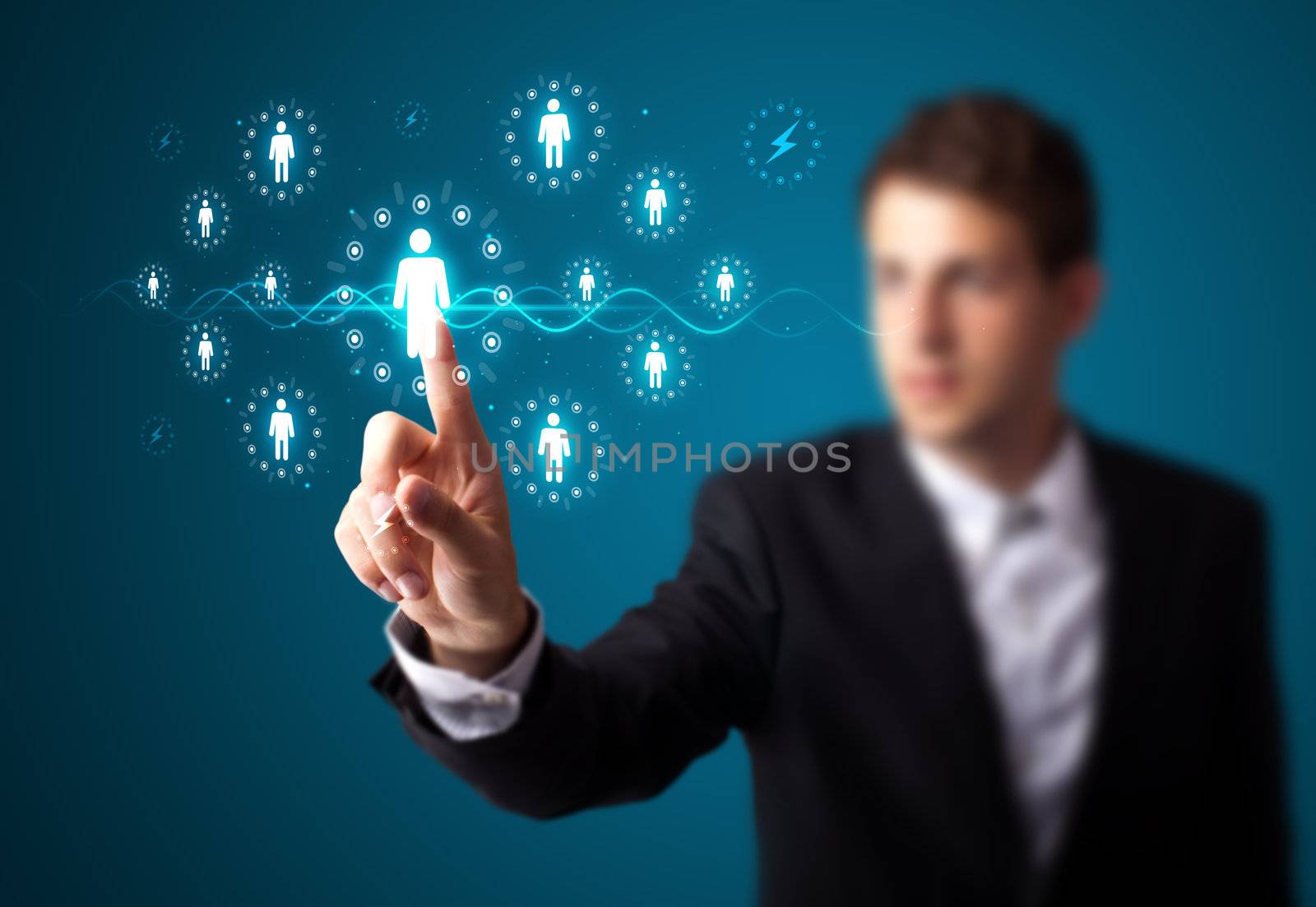 Businessman pressing modern social buttons on a virtual background