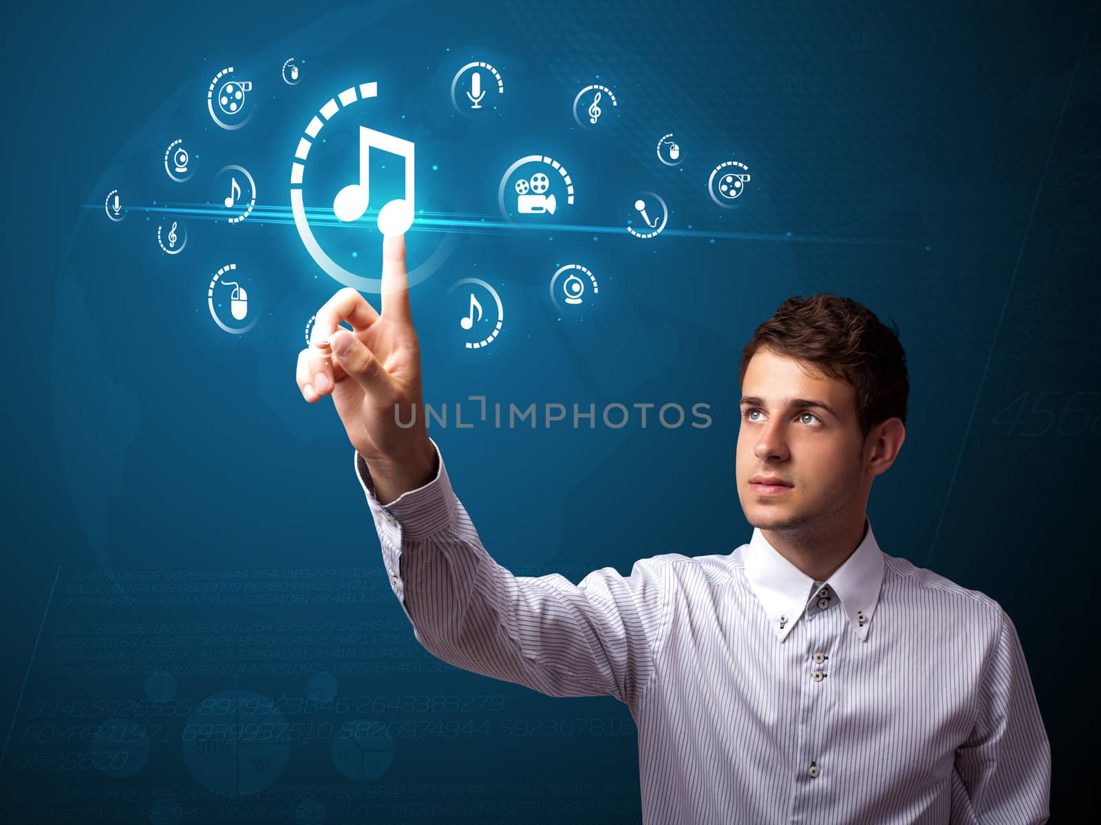 Businessman pressing multimedia type of modern buttons with virtual background