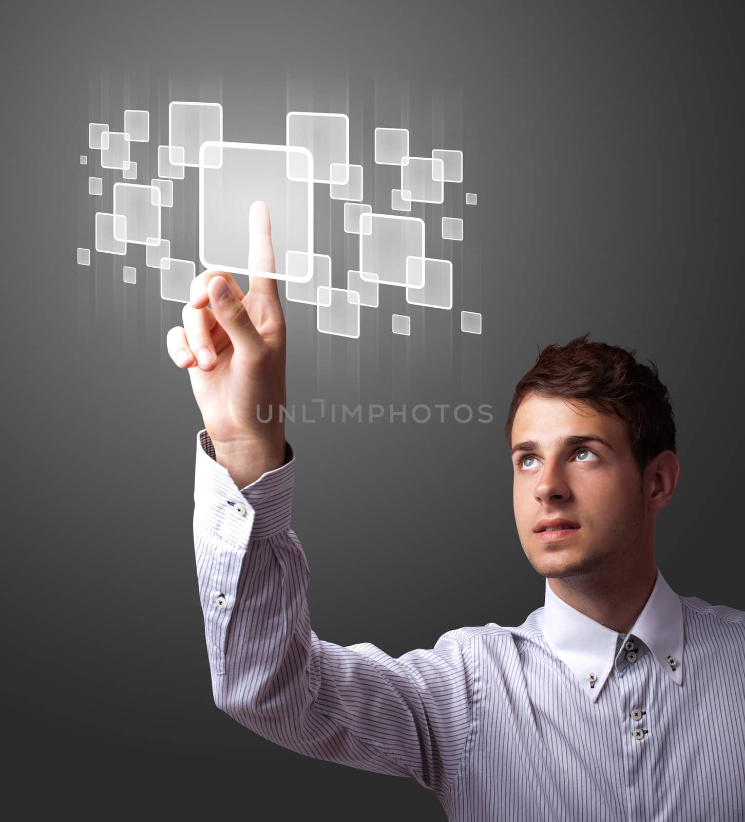 Businessman pressing high tech type of modern buttons on a virtual background