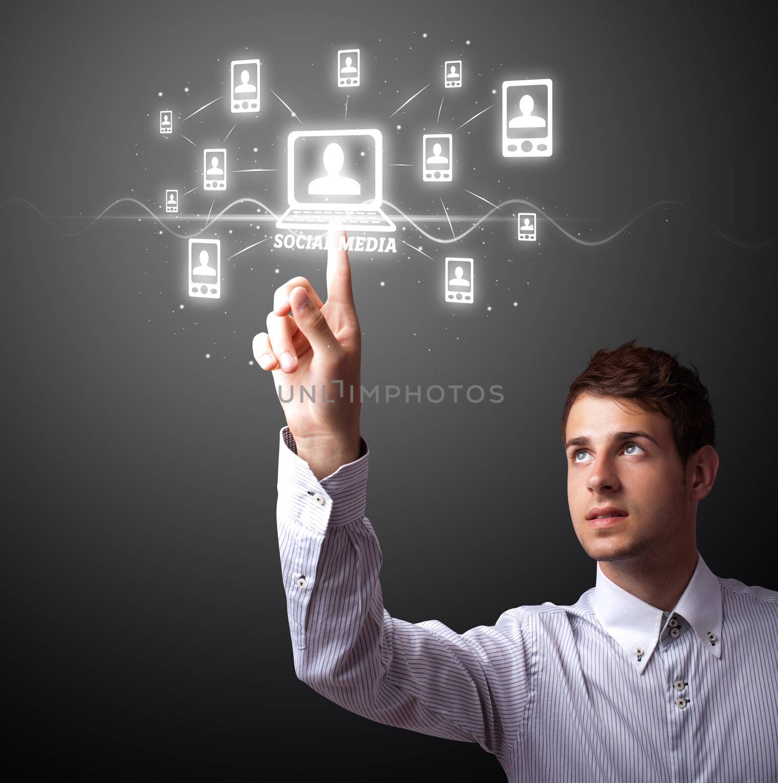 Businessman pressing modern social buttons on a virtual background