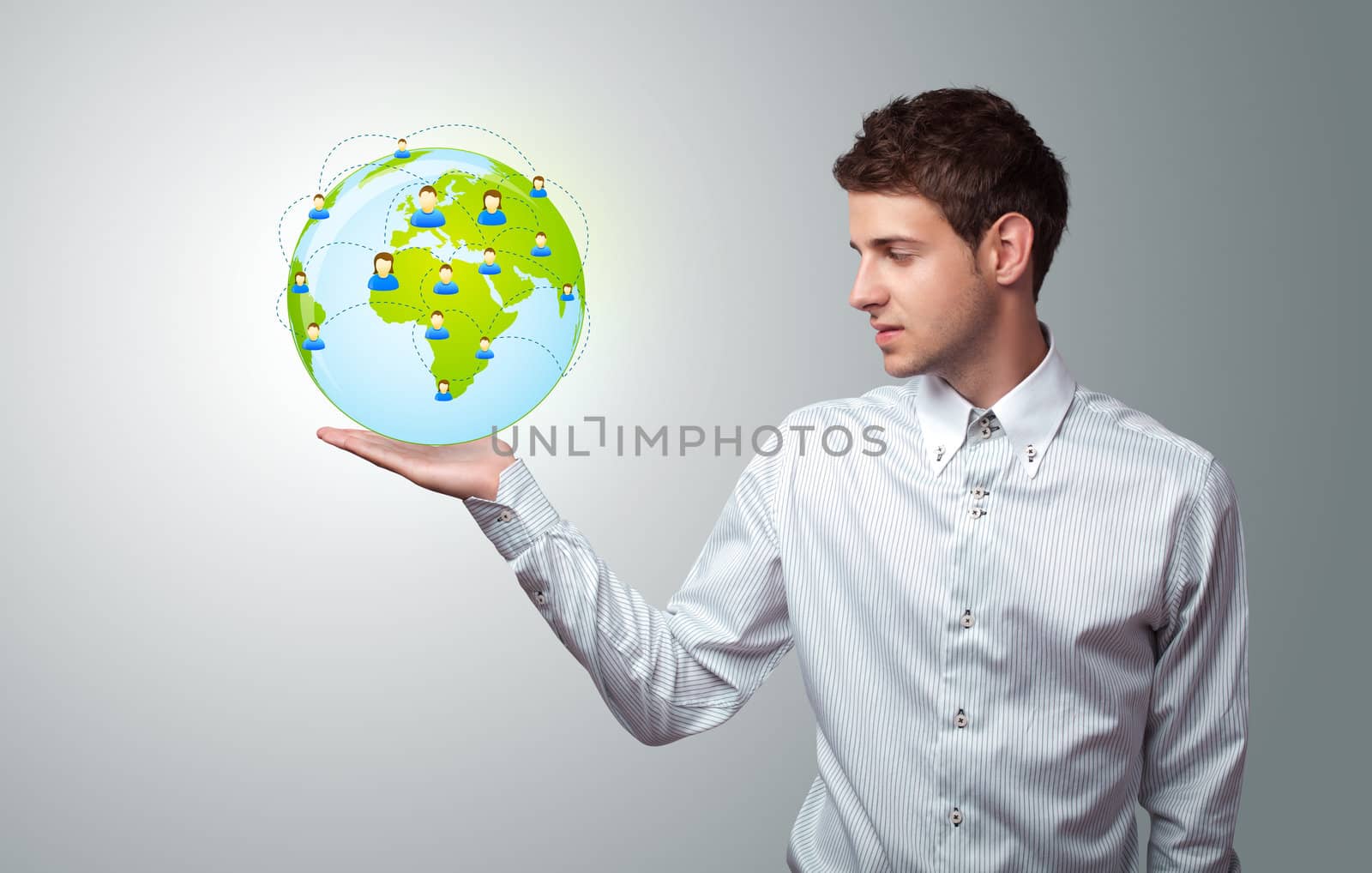 Young businessman holding virtual eco sign