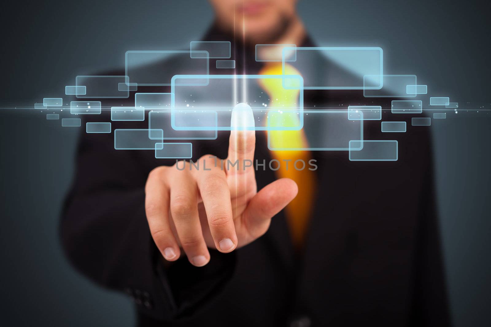 Businessman pressing high tech type of modern buttons on a virtual background