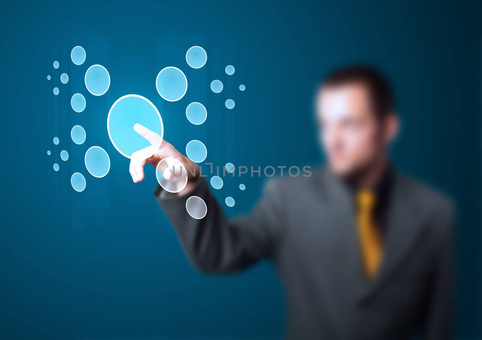 Businessman pressing high tech type of modern buttons on a virtual background