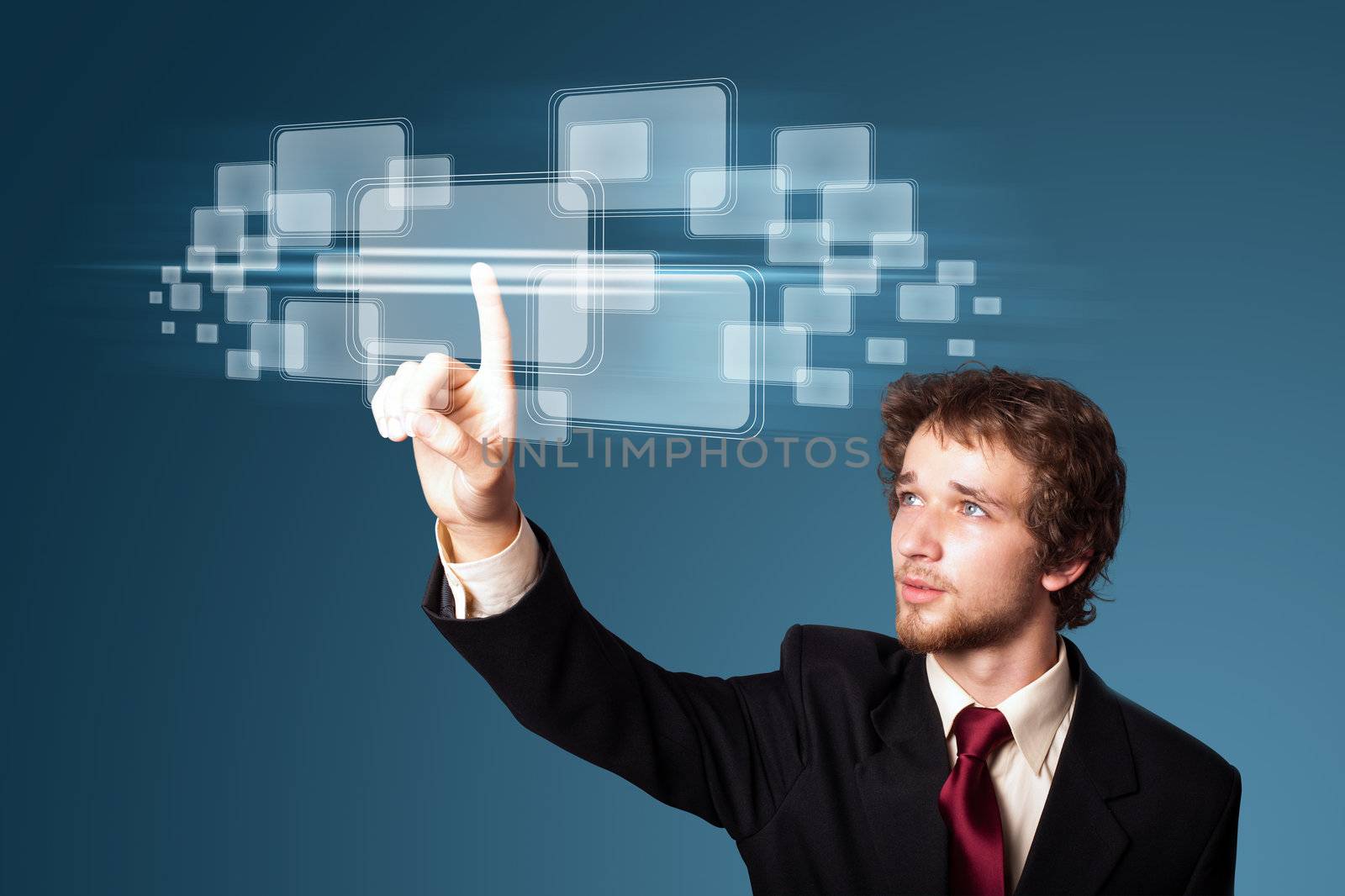 Businessman pressing high tech type of modern buttons on a virtual background