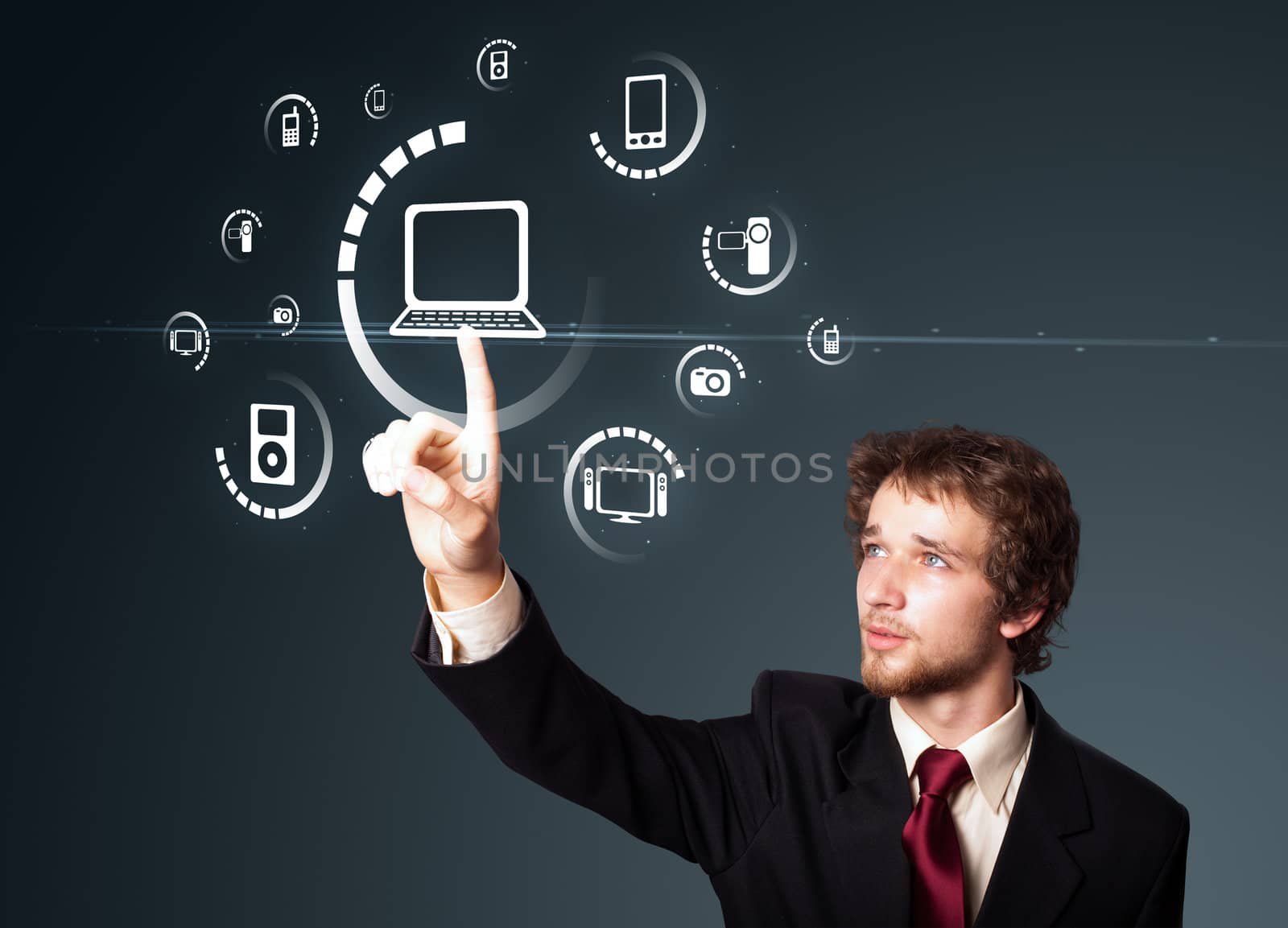 Businessman pressing multimedia type of modern buttons with virtual background