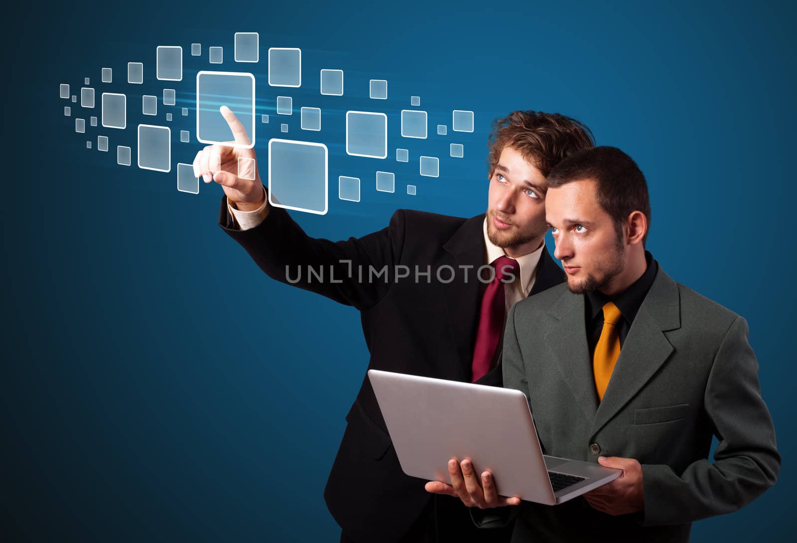 Businessman pressing high tech type of modern buttons on a virtual background