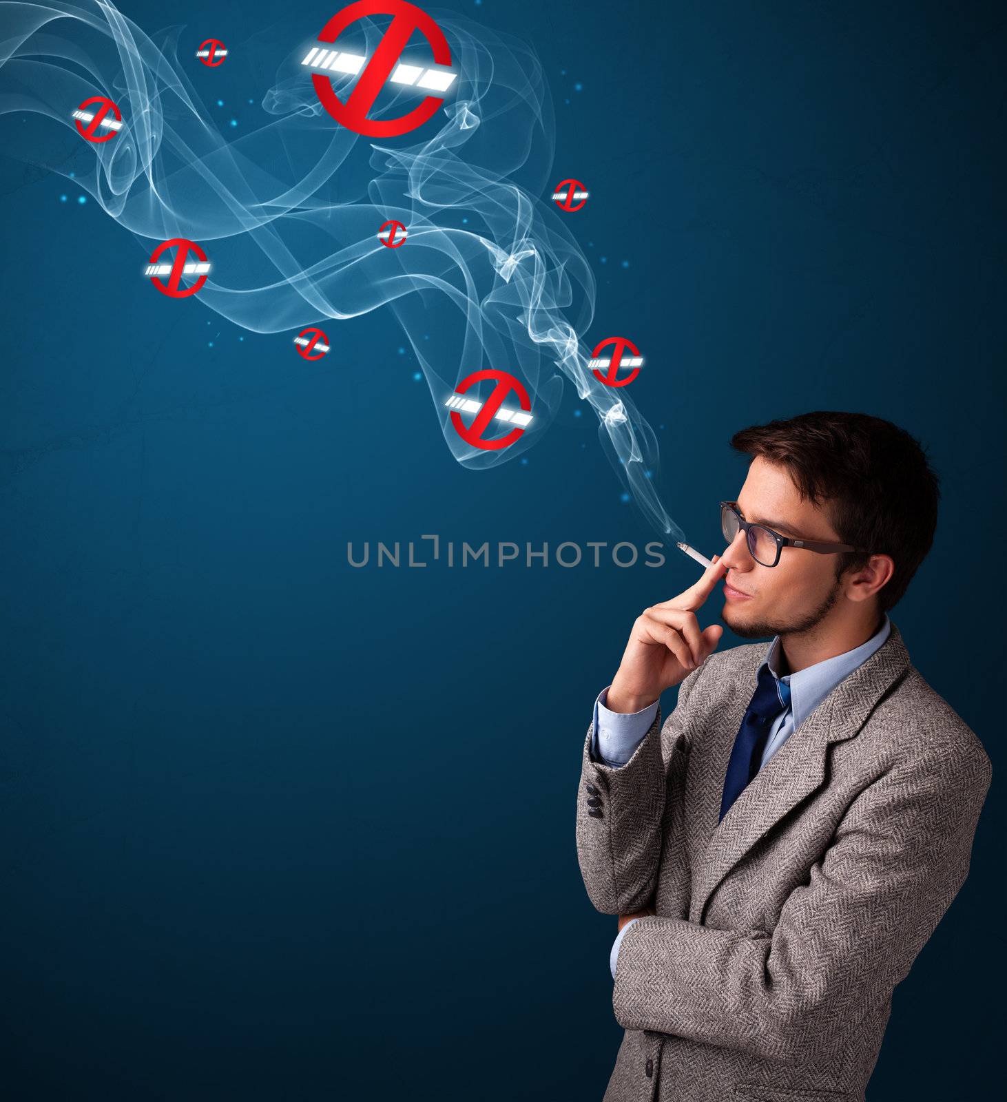 Attractive young man smoking dangerous cigarette with no smoking signs