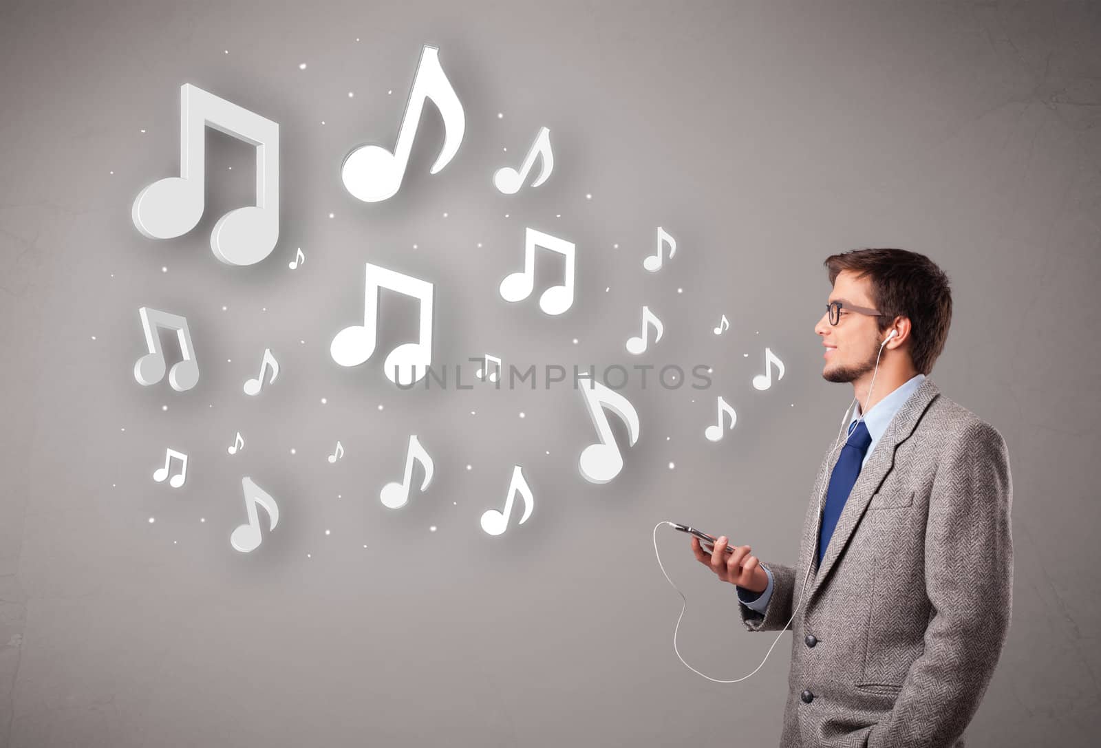attractive young man singing and listening to music with musical by ra2studio
