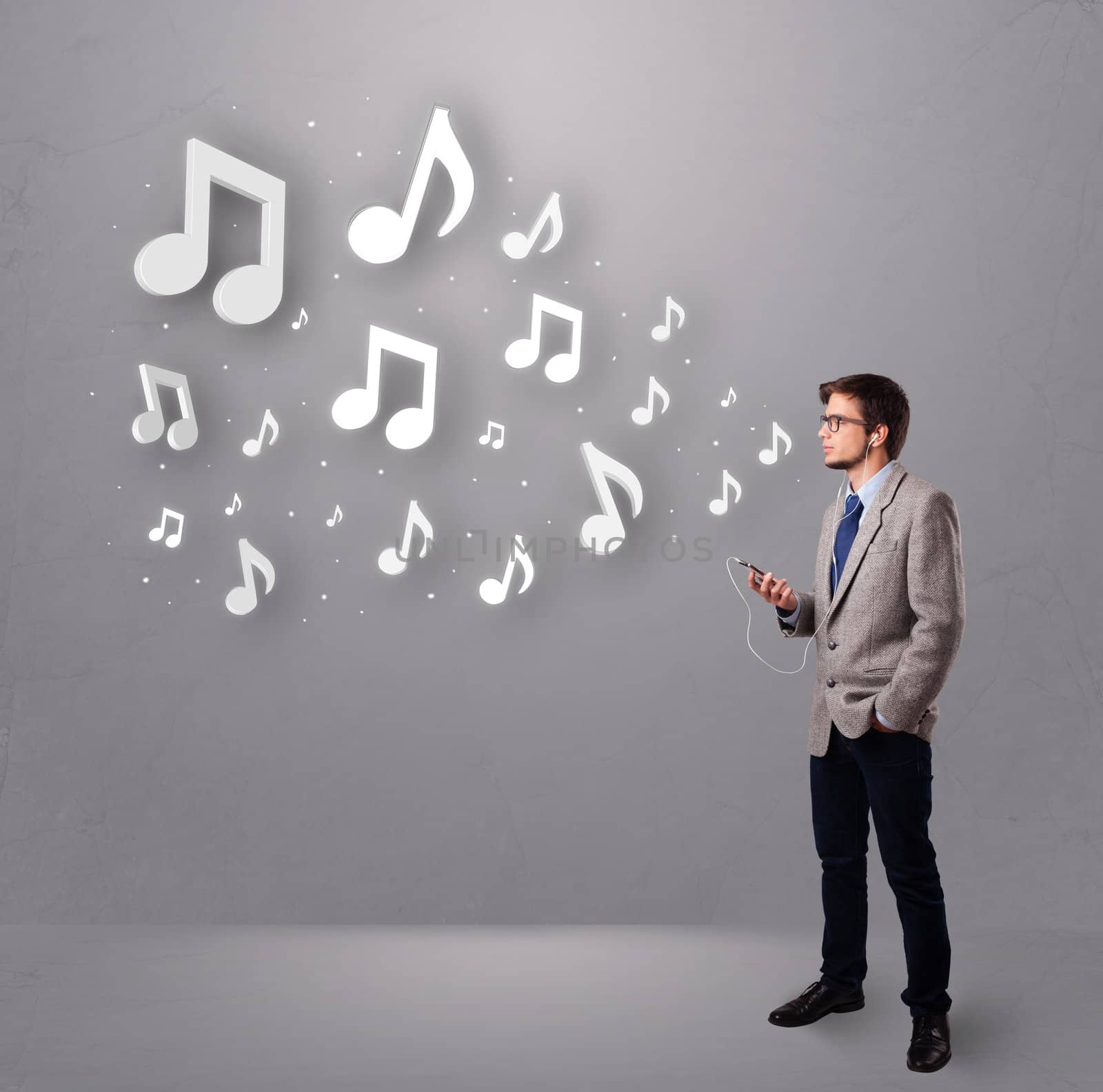 attractive young man singing and listening to music with musical by ra2studio