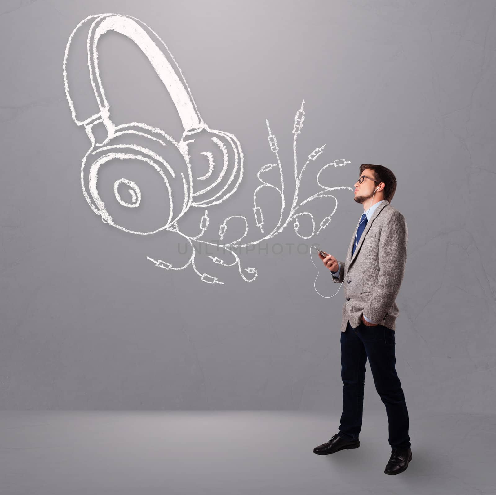 attractive man singing and listening to music with abstract headphone getting out of his mouth