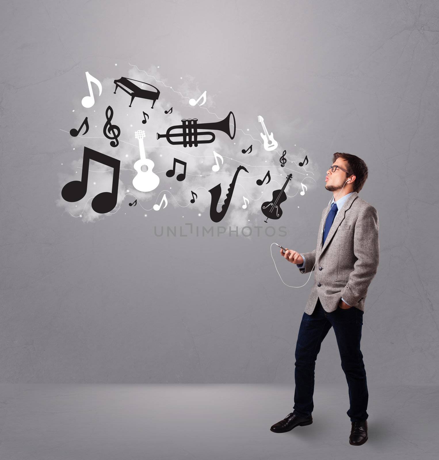 attractive young man singing and listening to music with musical by ra2studio