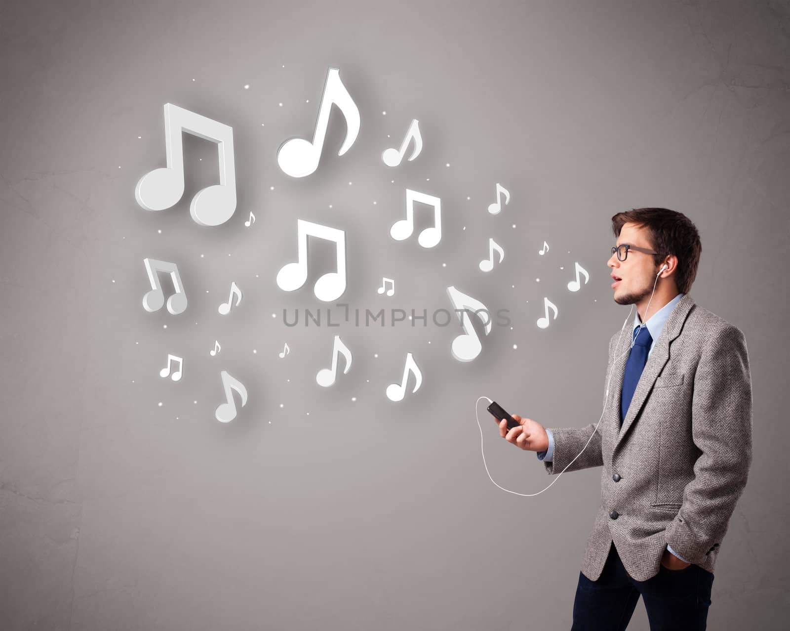 attractive young man singing and listening to music with musical by ra2studio