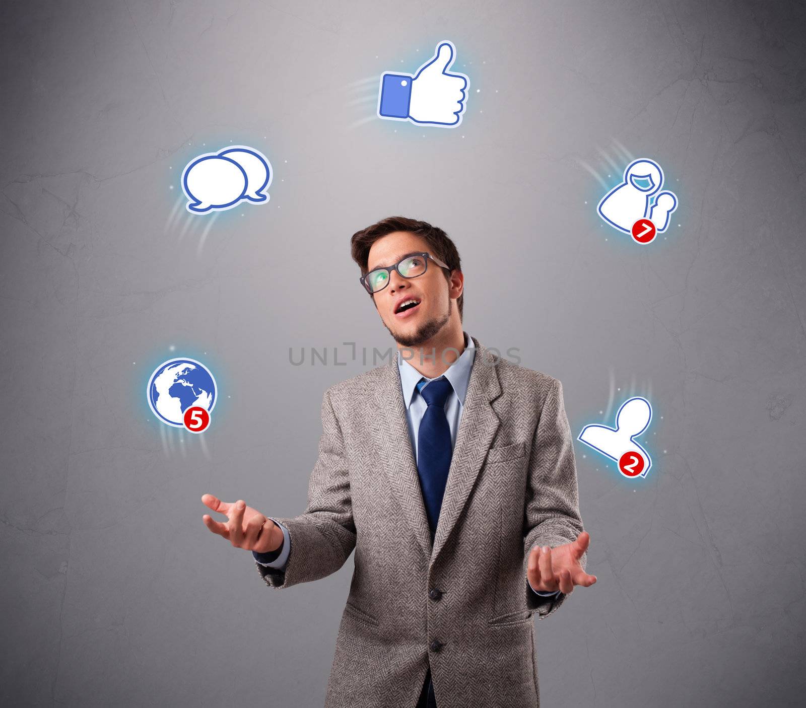 handsome young boy juggling with social media icons by ra2studio