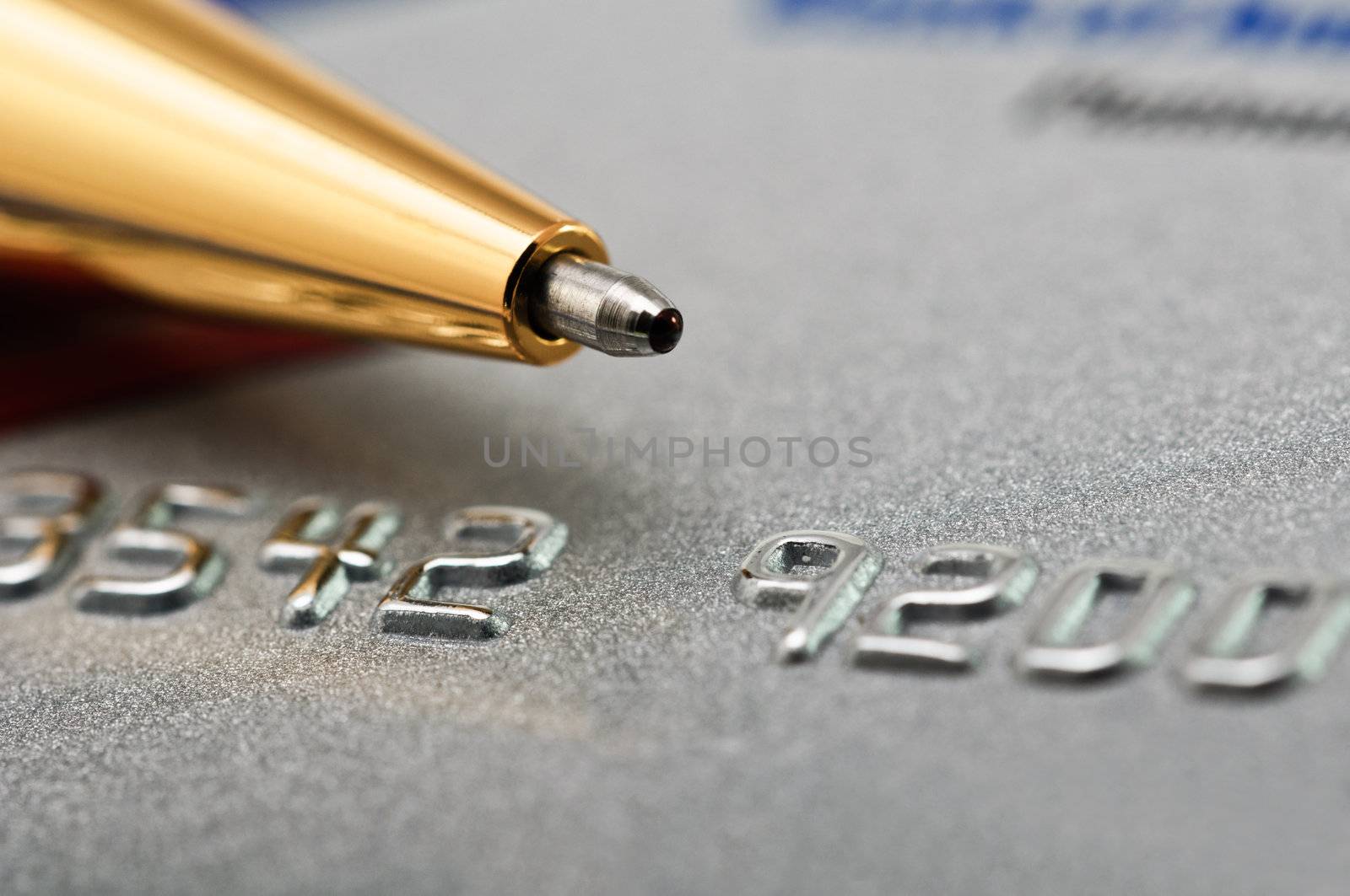 Credit card and pen as a background. by lobzik