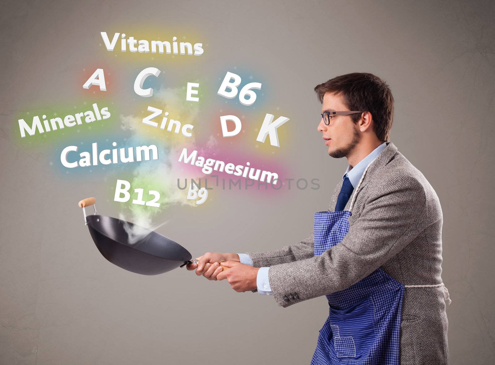 Handsome man cooking vitamins and minerals