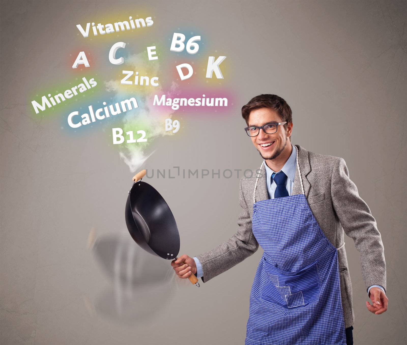 Handsome man cooking vitamins and minerals