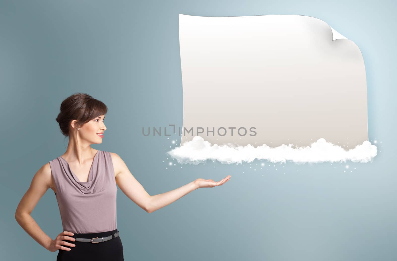 pretty young woman presenting modern copy space on clouds