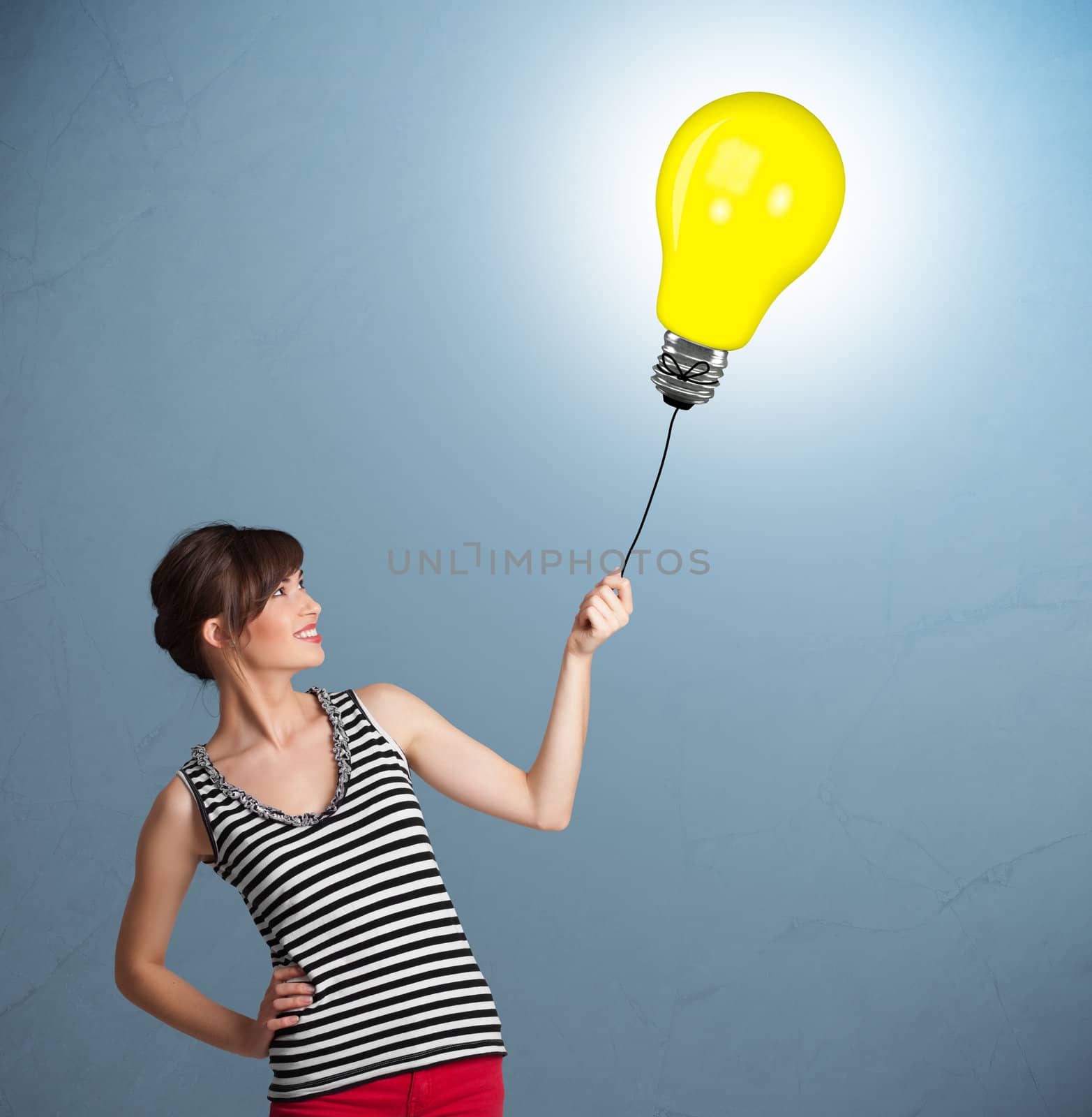 Pretty lady holding a light bulb balloon by ra2studio
