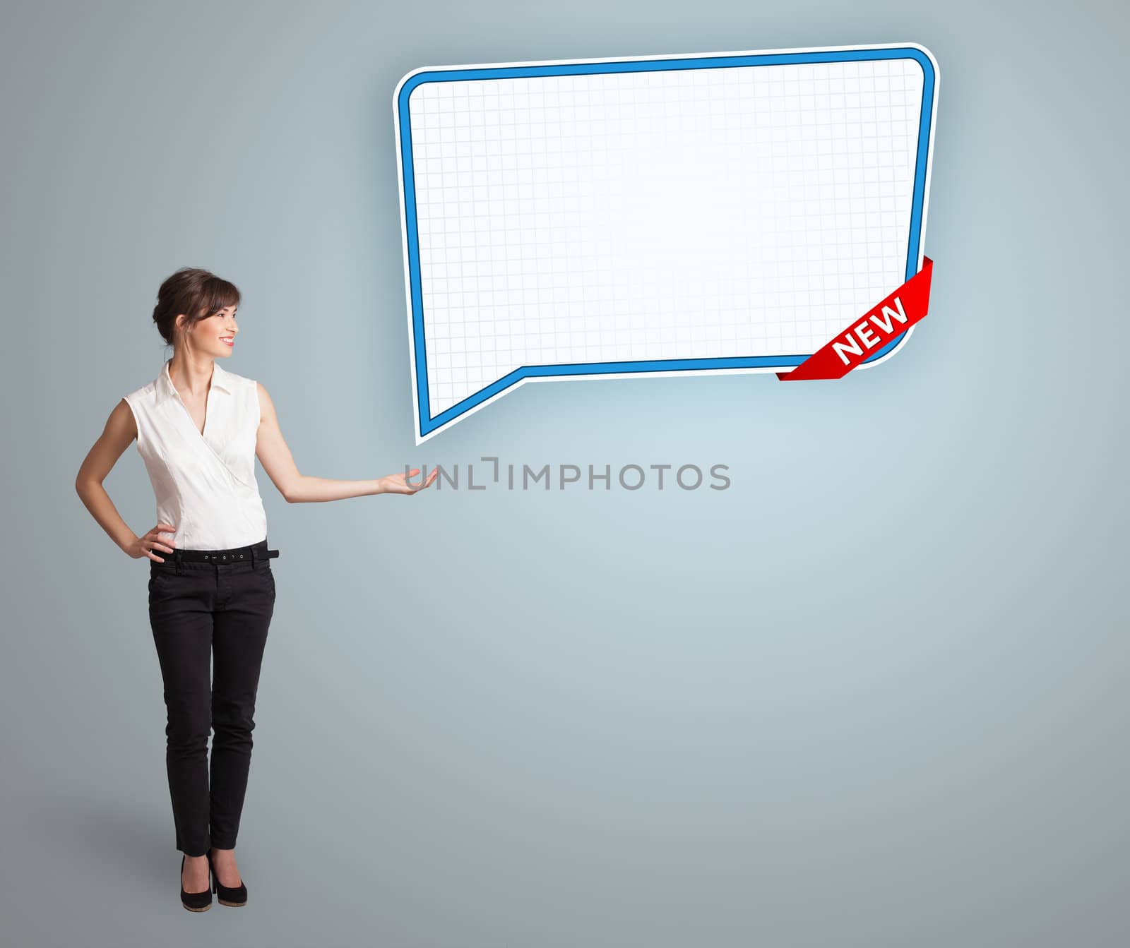 Beautiful young woman presenting modern speech bubble copy space