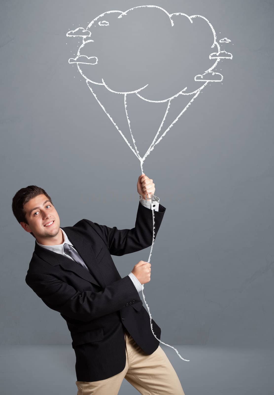 Handsome young man holding cloud balloon drawing