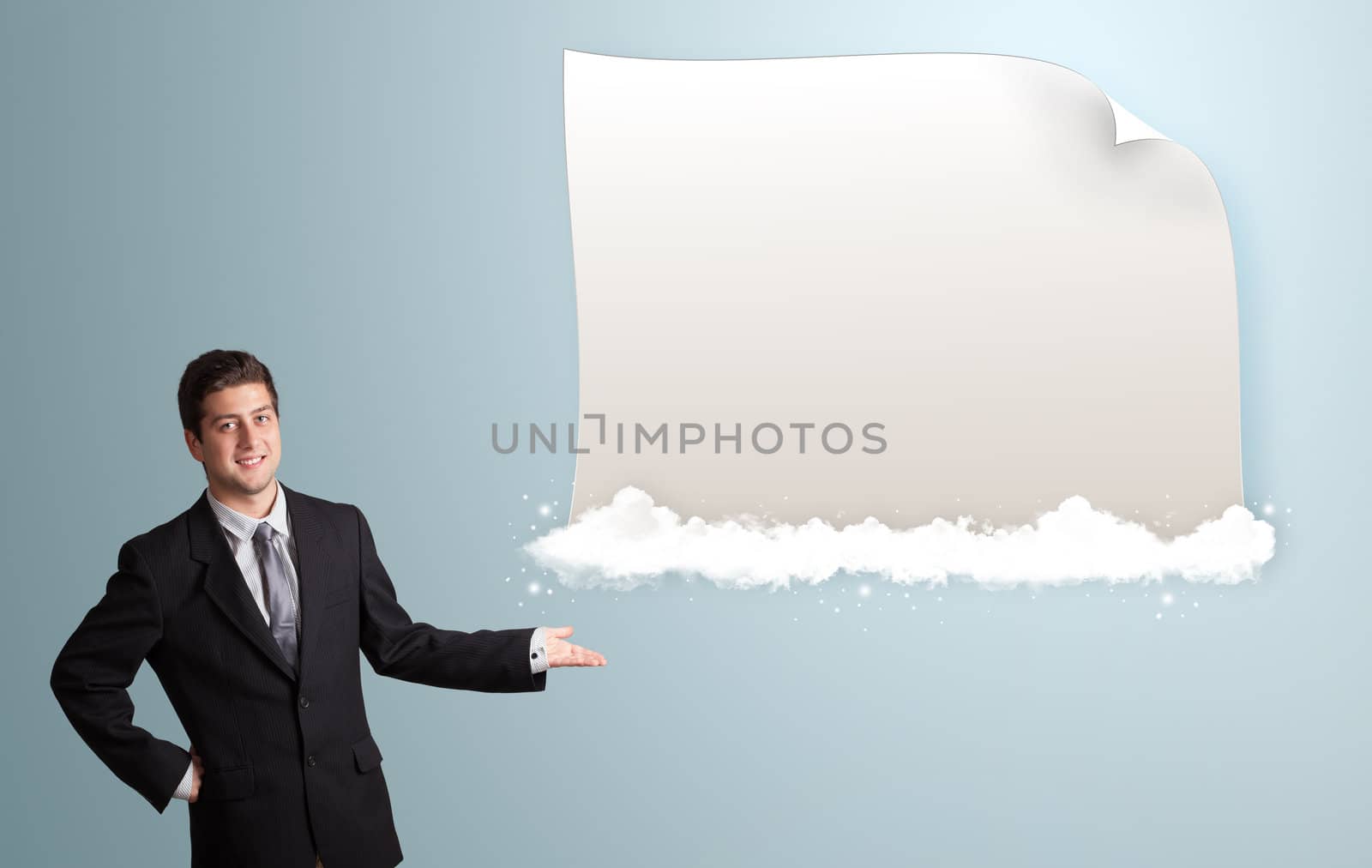attractive young man presenting modern copy space on clouds