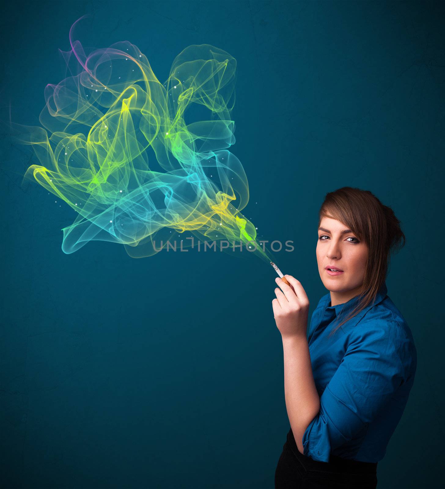 Pretty young lady smoking cigarette with colorful smoke