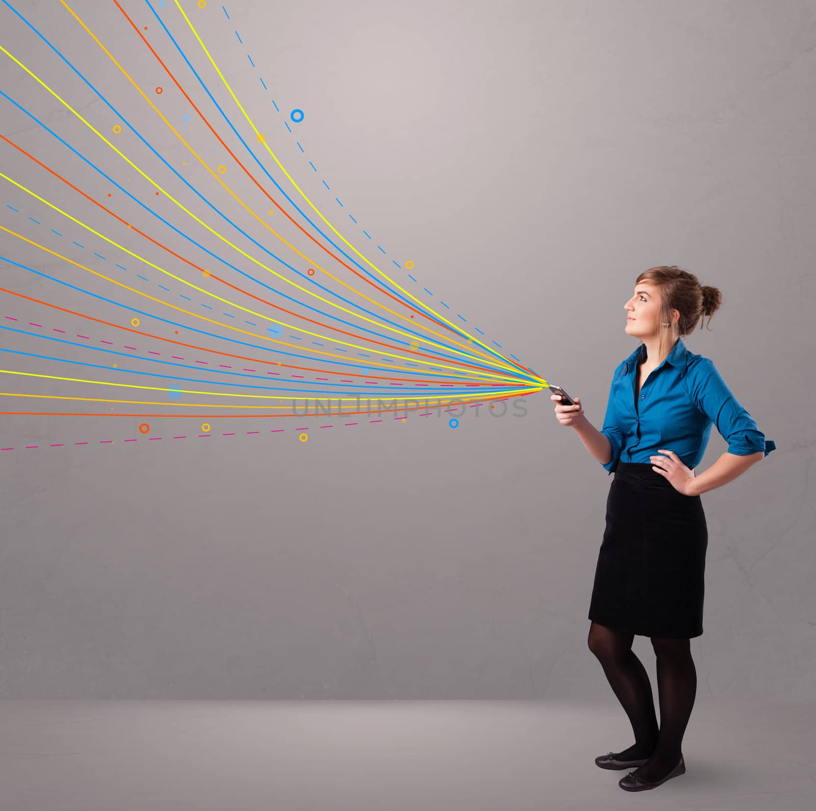 Happy young girl holding a phone with colorful abstract lines