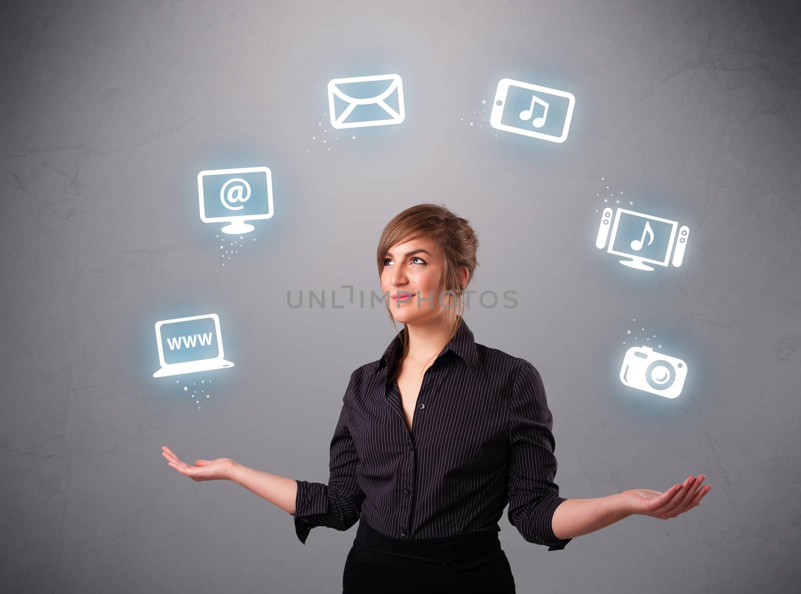 pretty girl standing and juggling with elecrtonic devices icons