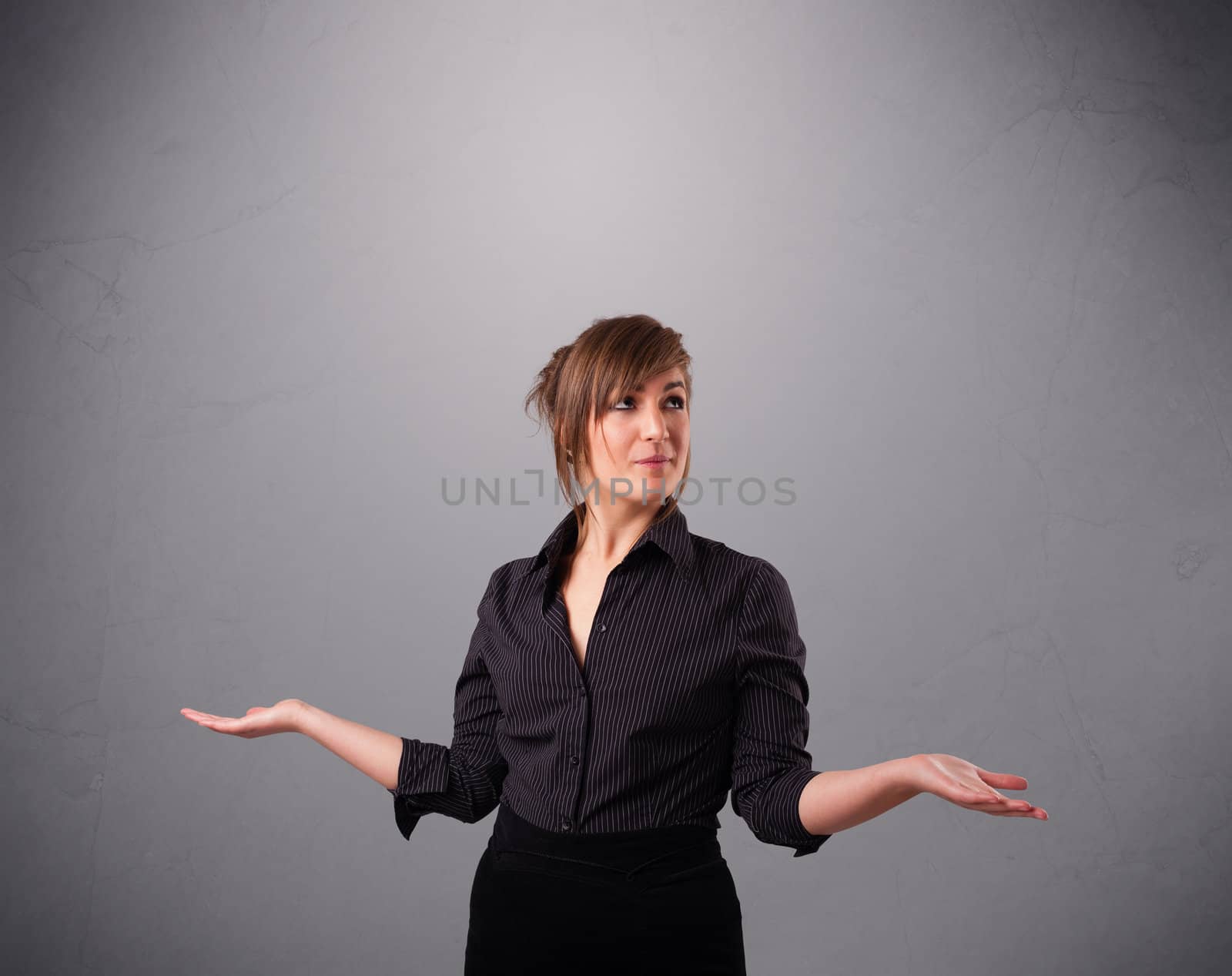beautiful young lady standing and juggling with copy space