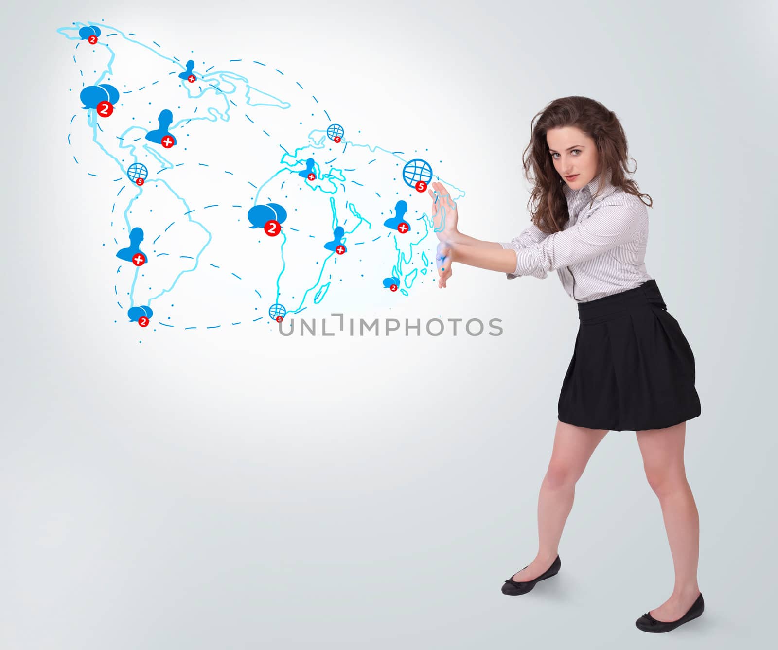 Young business woman presenting social map by ra2studio
