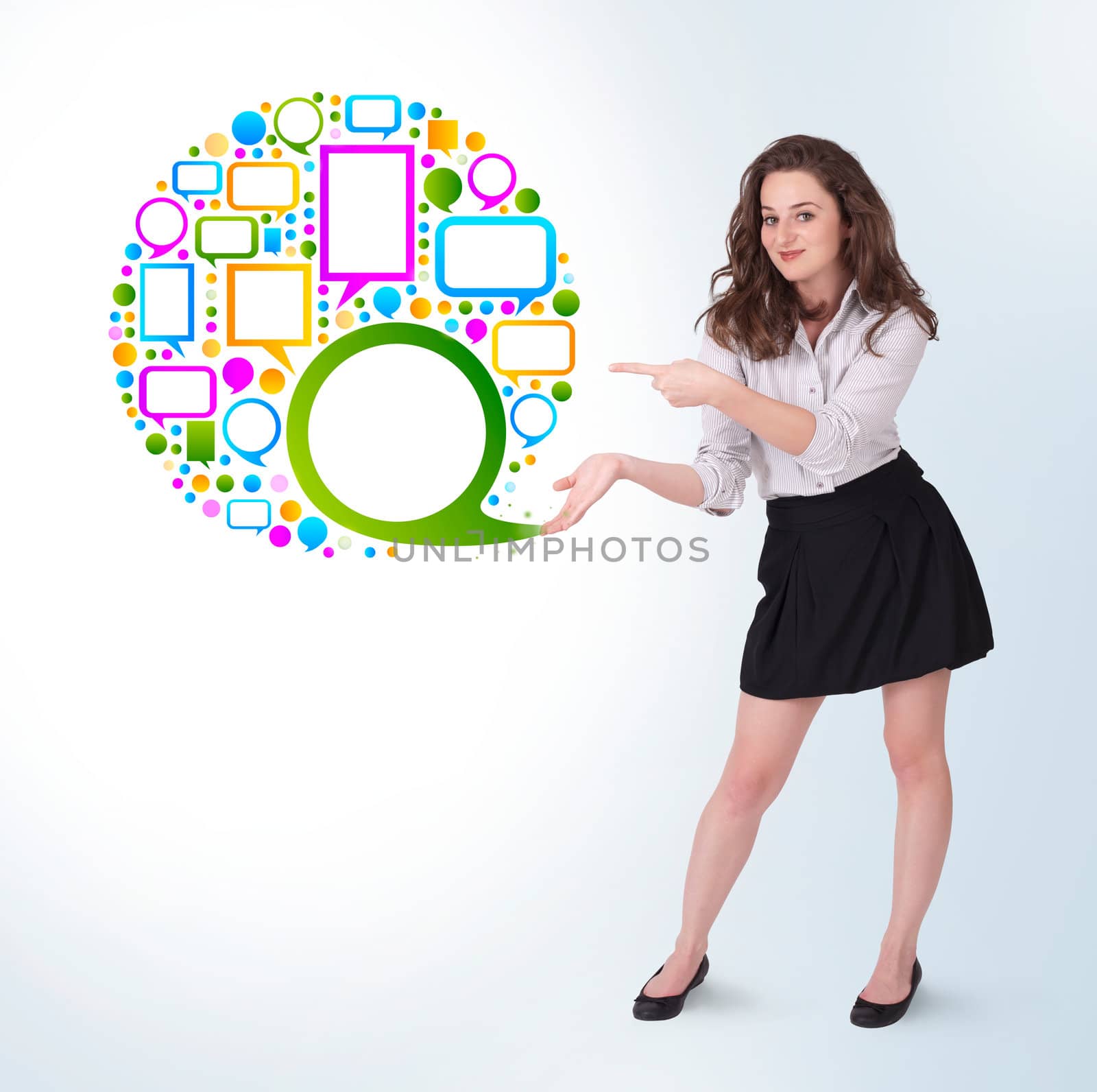 Young business woman presenting colourful speach bubble on bright background