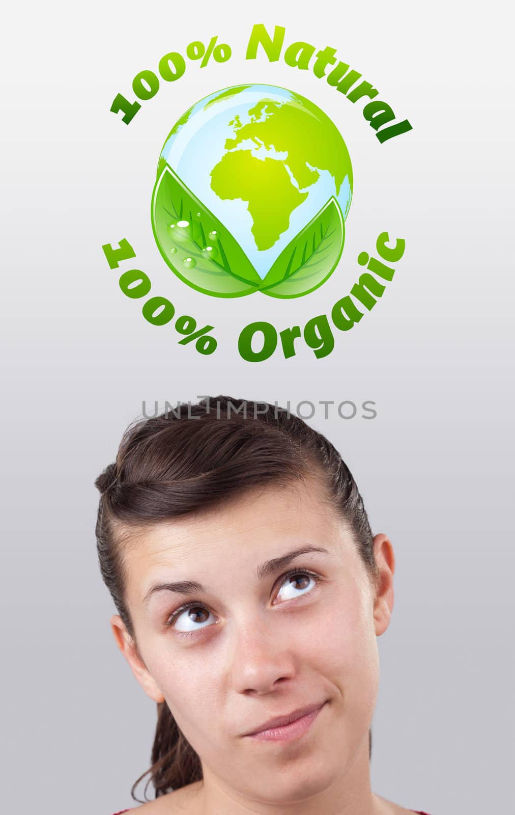 Young girl looking at green eco sign by ra2studio