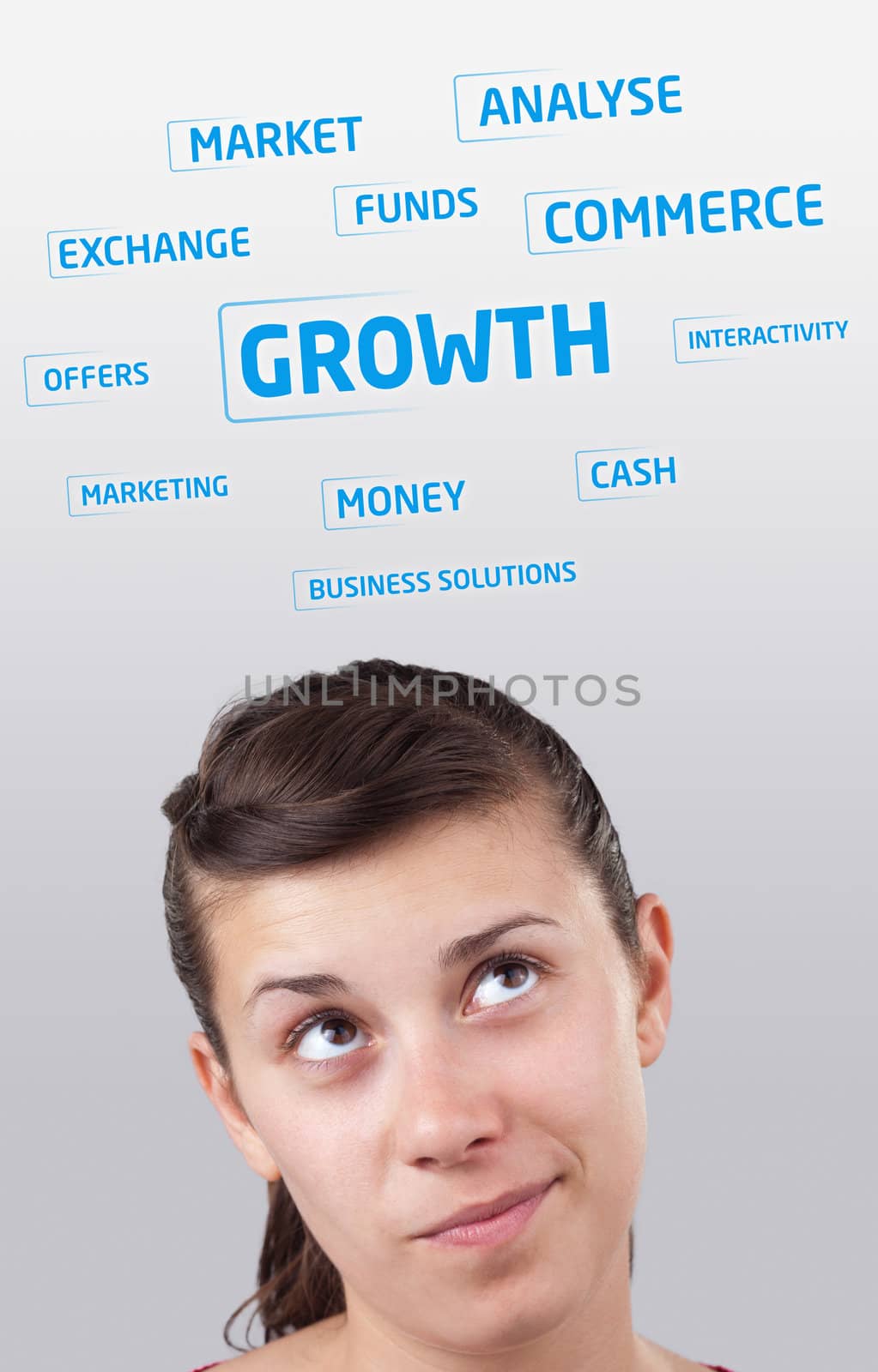 Young girl head looking at business icons and images