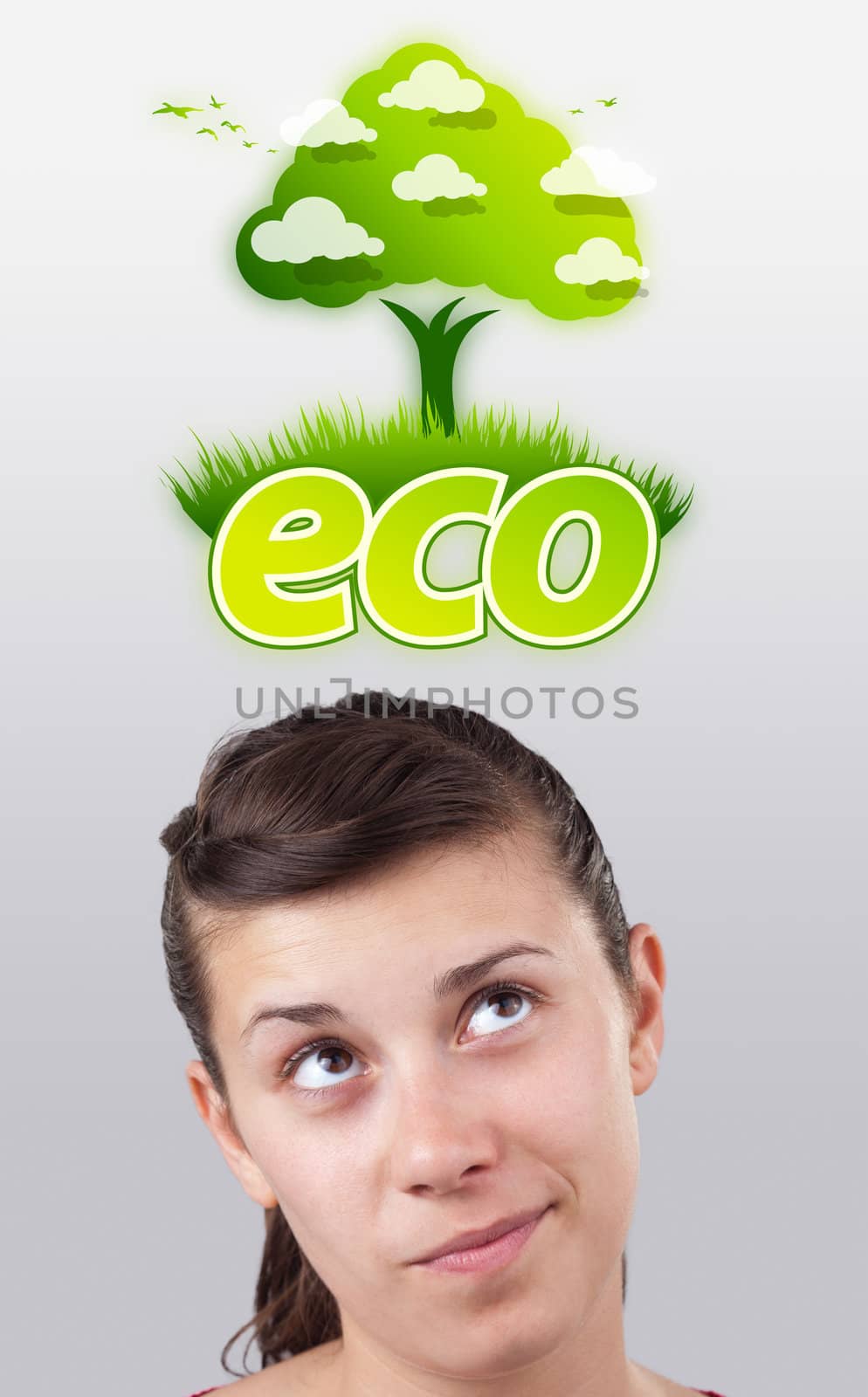 Young girl looking at green eco sign by ra2studio