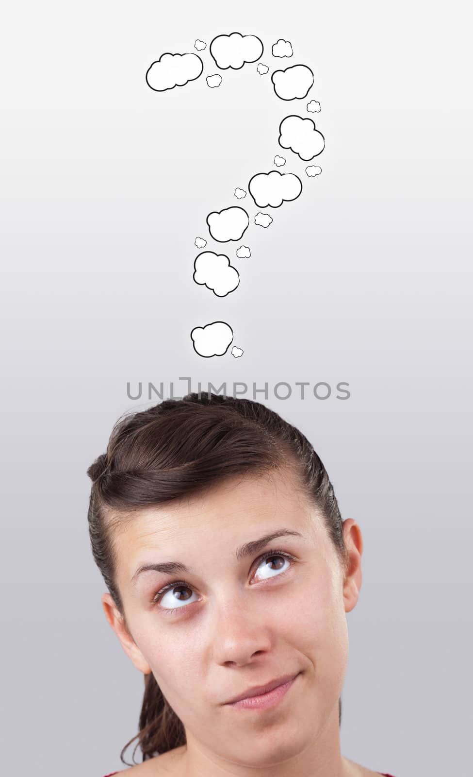 Young persons head looking with gesture at writing marks