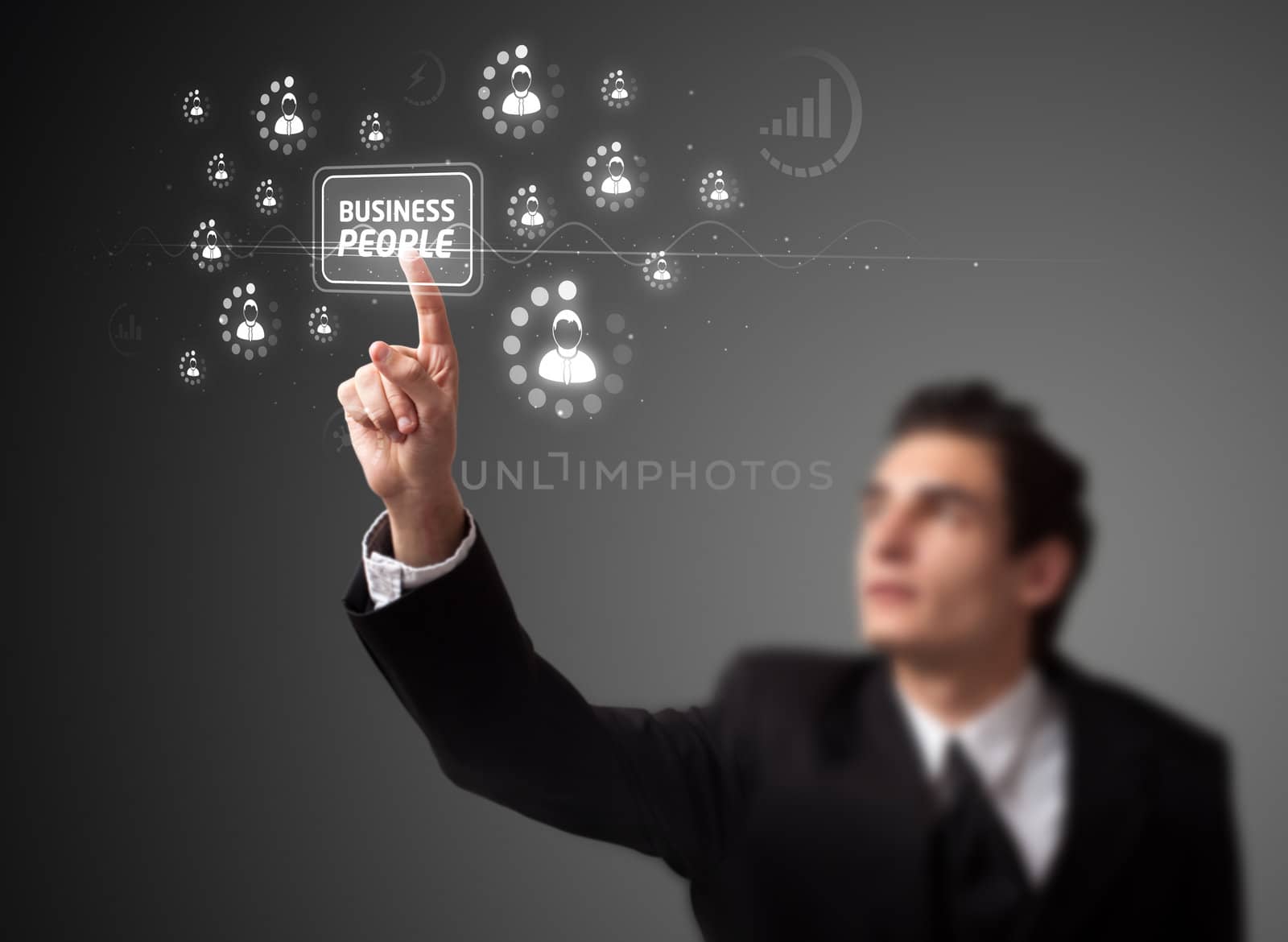 Businessman pressing business type of modern buttons with virtual background