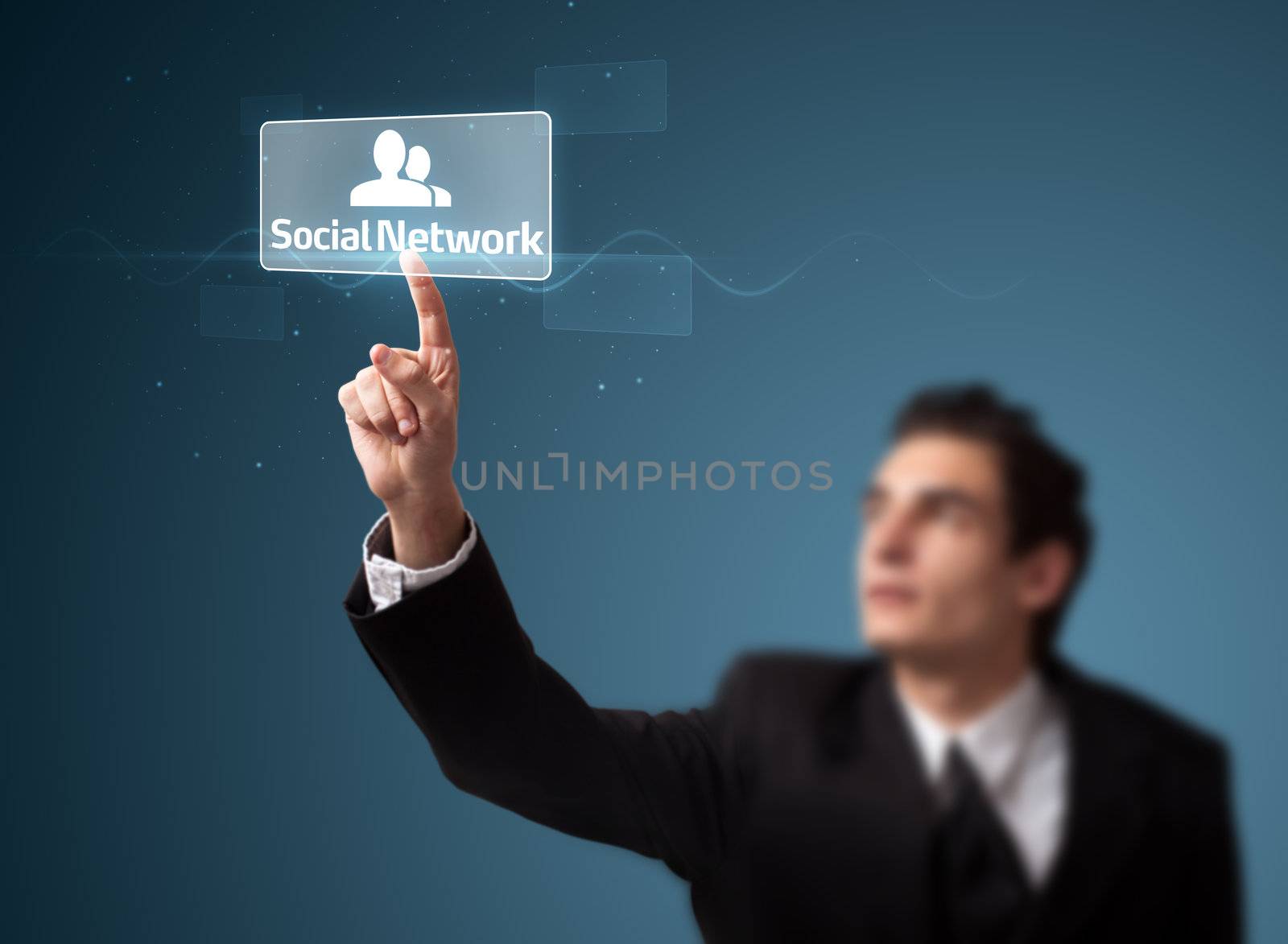 Businessman pressing modern social buttons on a virtual background