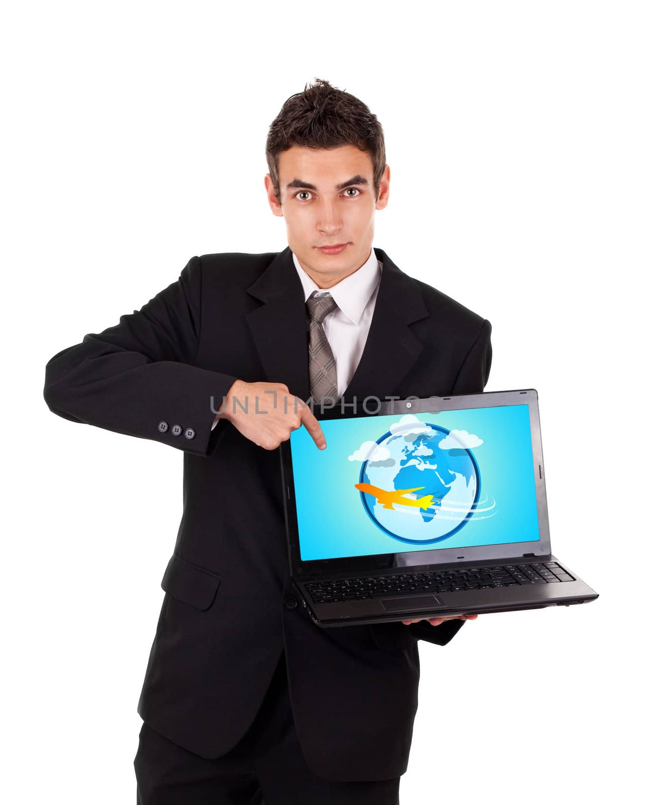 Business man pointing at a laptop with airplane, isolated on white